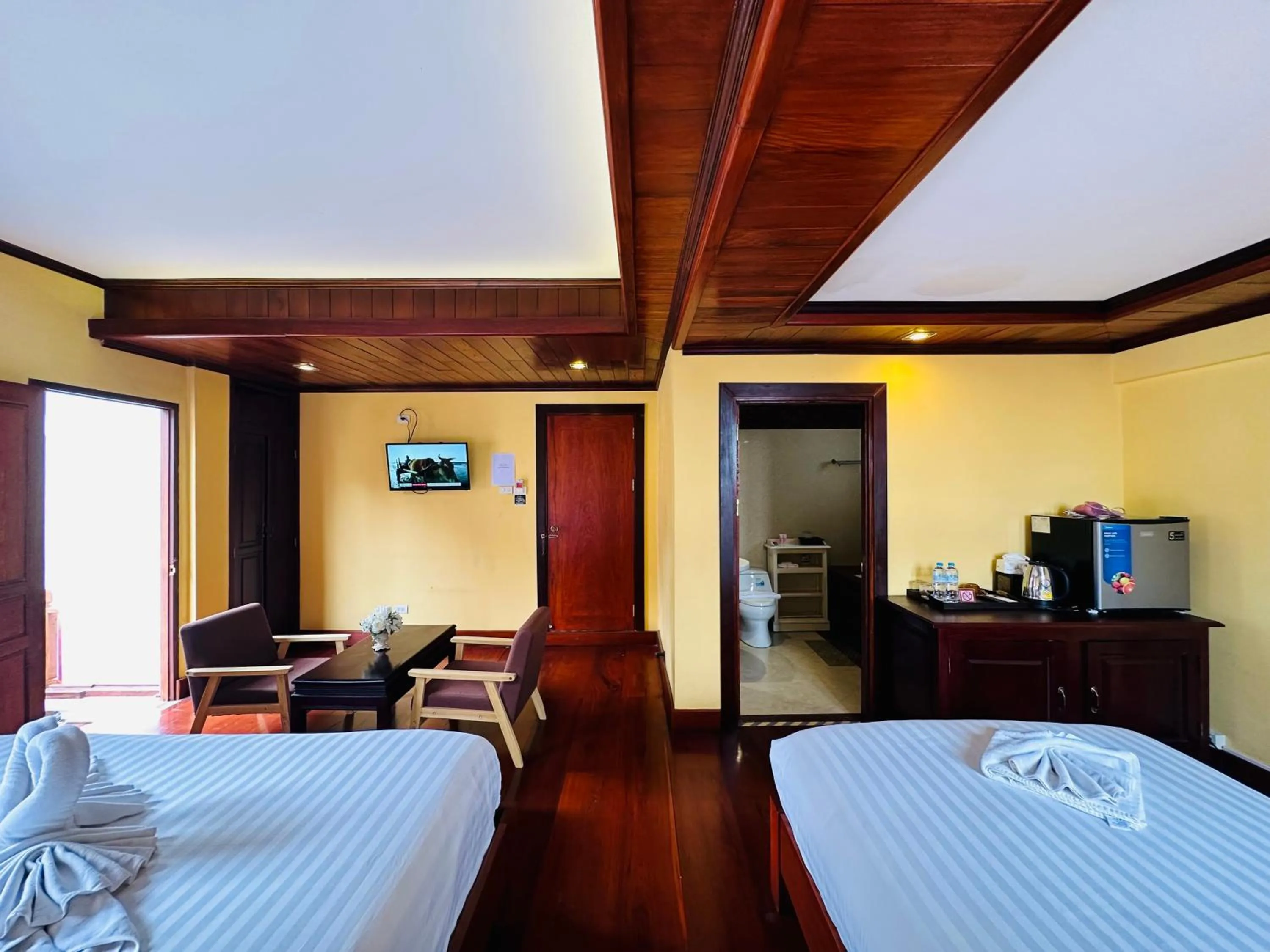 Bed in Villa Phonethip Mekong Riverside