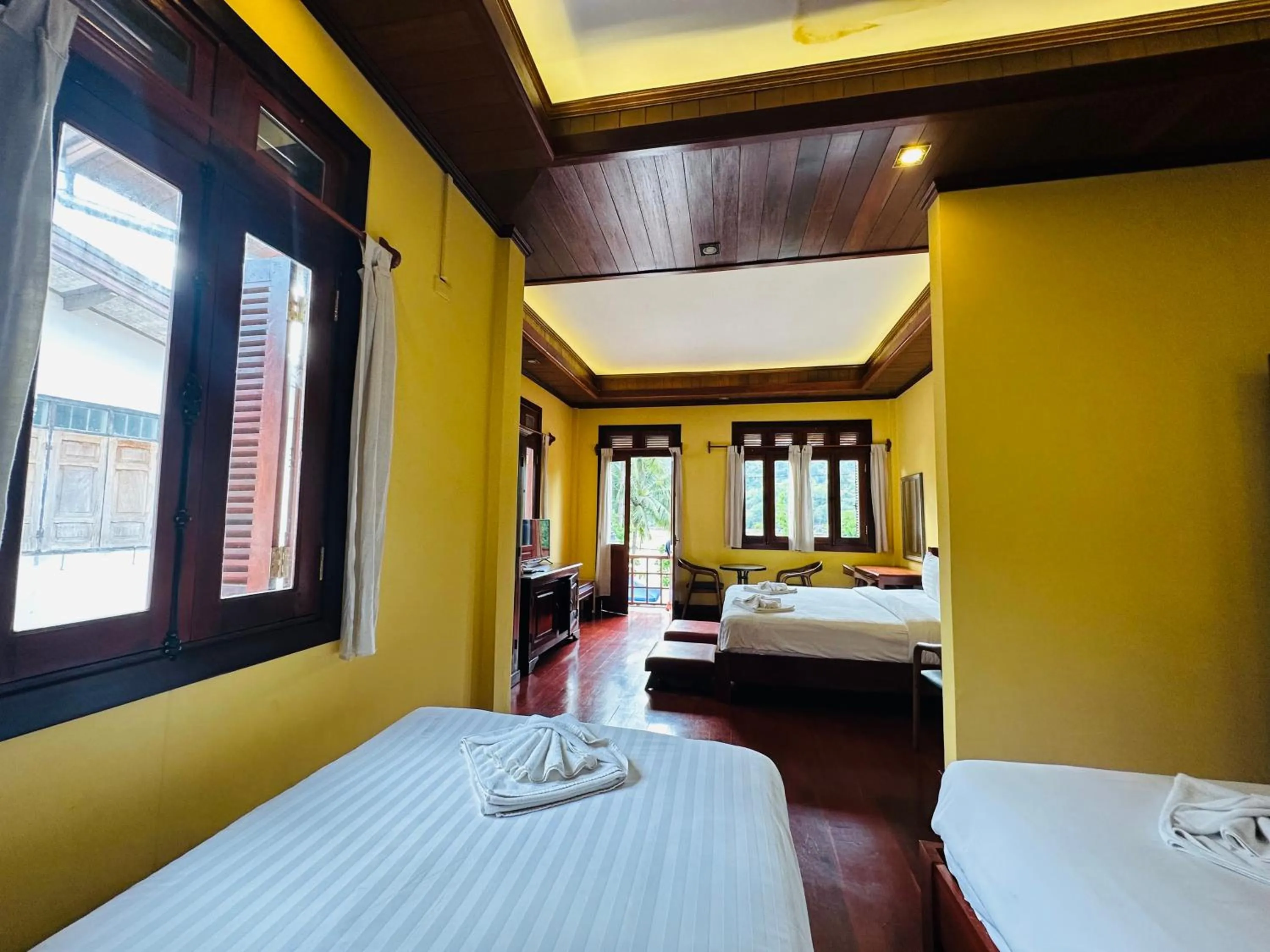 Bed in Villa Phonethip Mekong Riverside