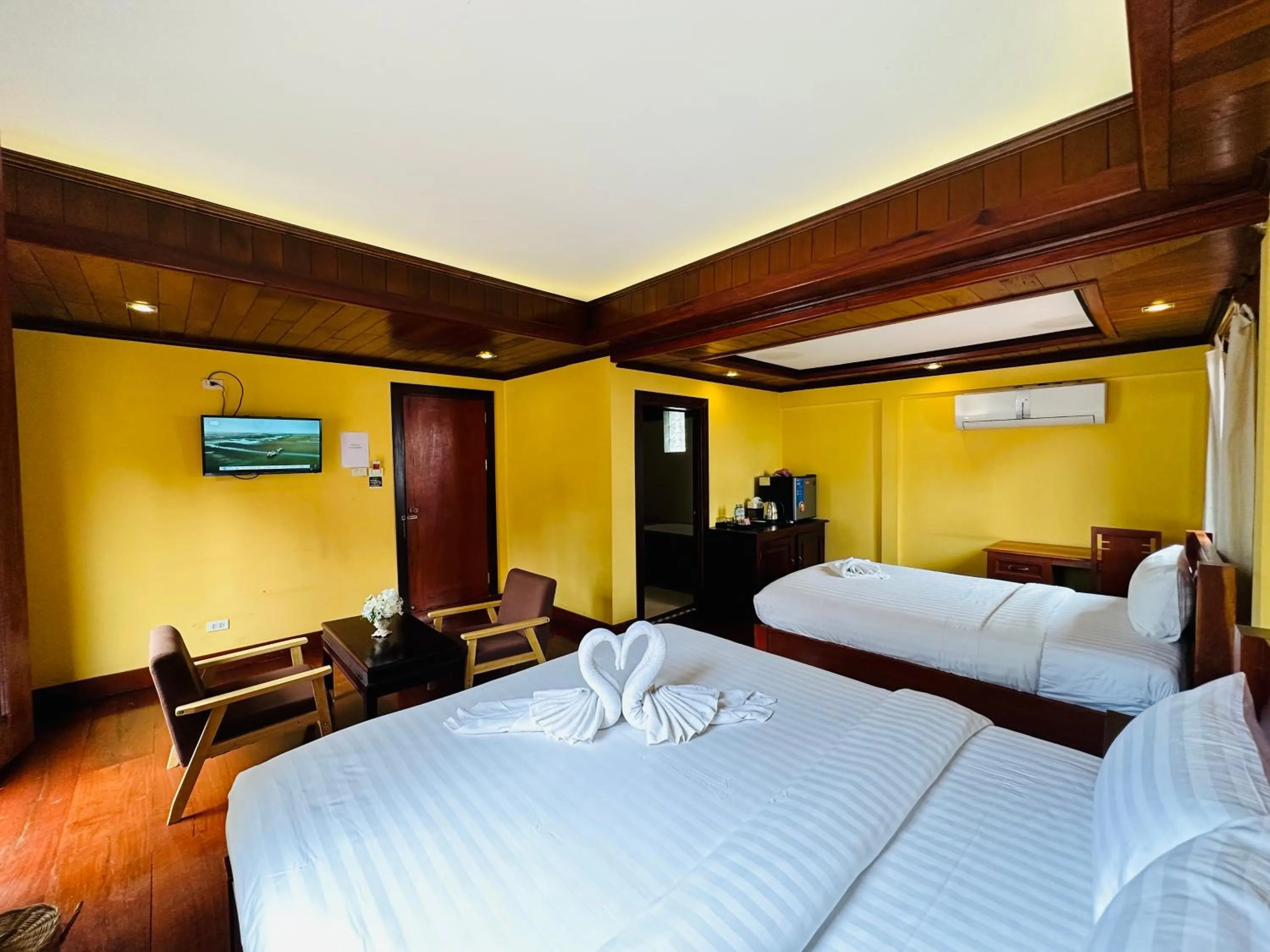 Bed in Villa Phonethip Mekong Riverside