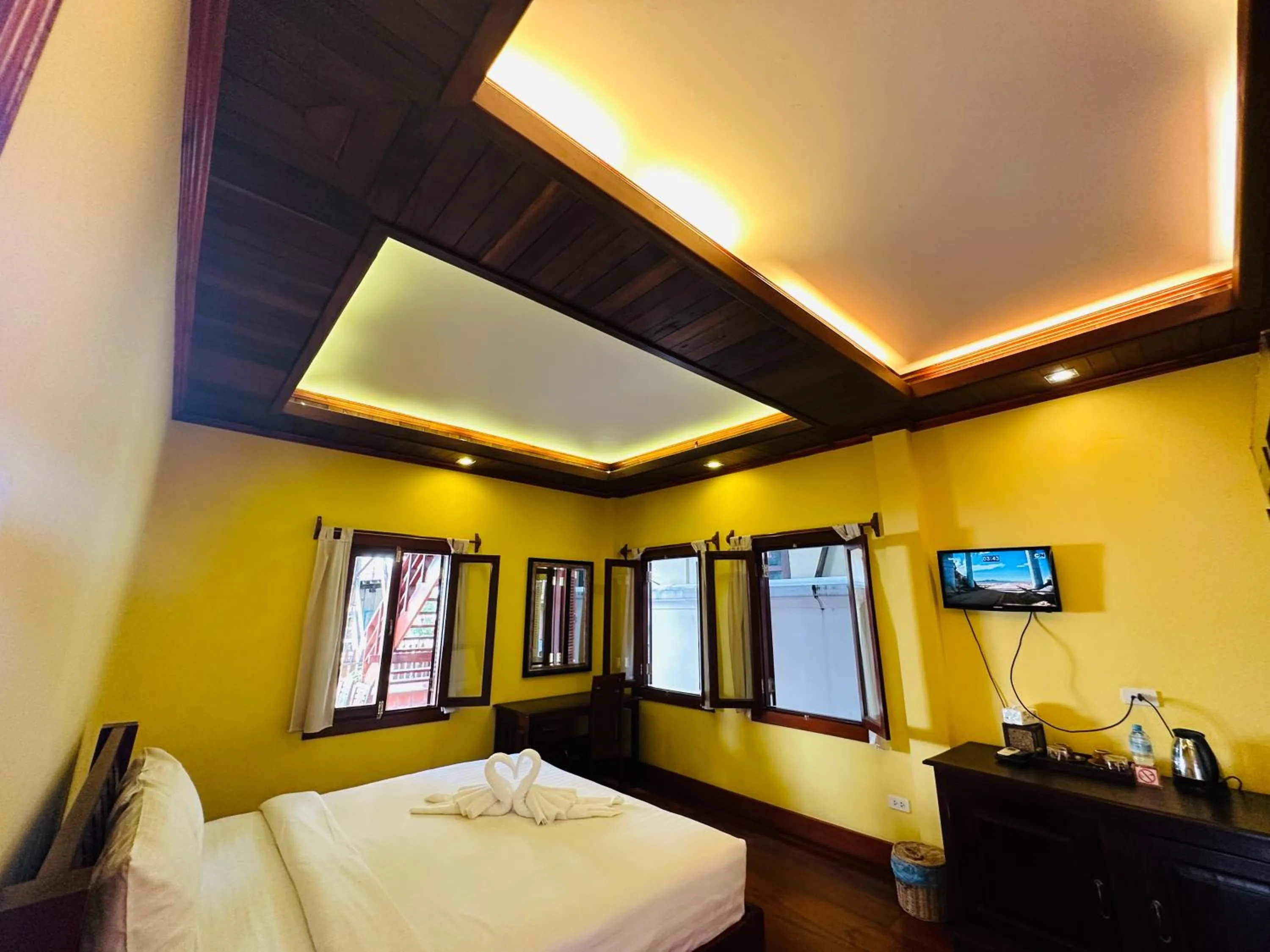 Bed in Villa Phonethip Mekong Riverside