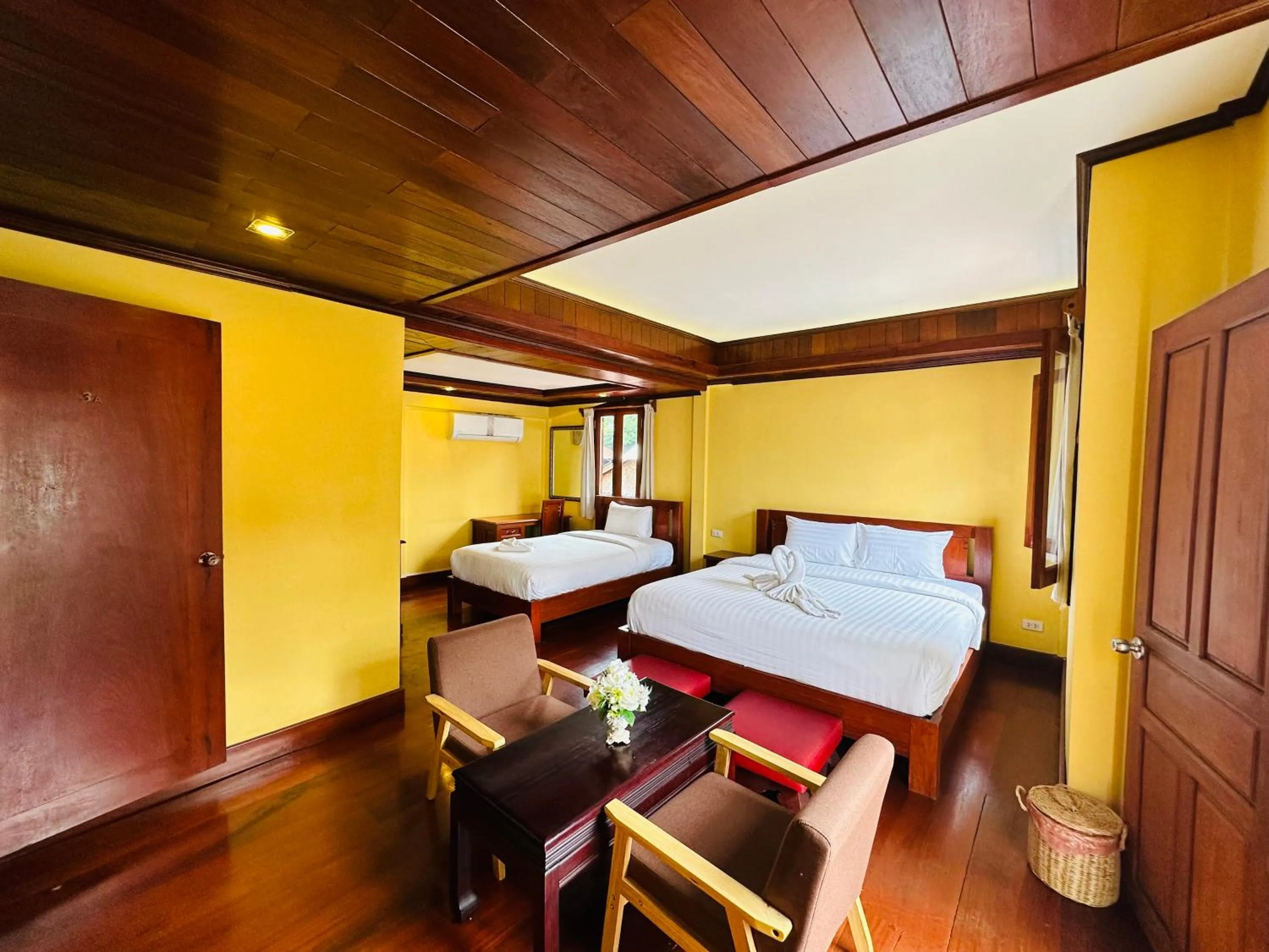 Bed in Villa Phonethip Mekong Riverside