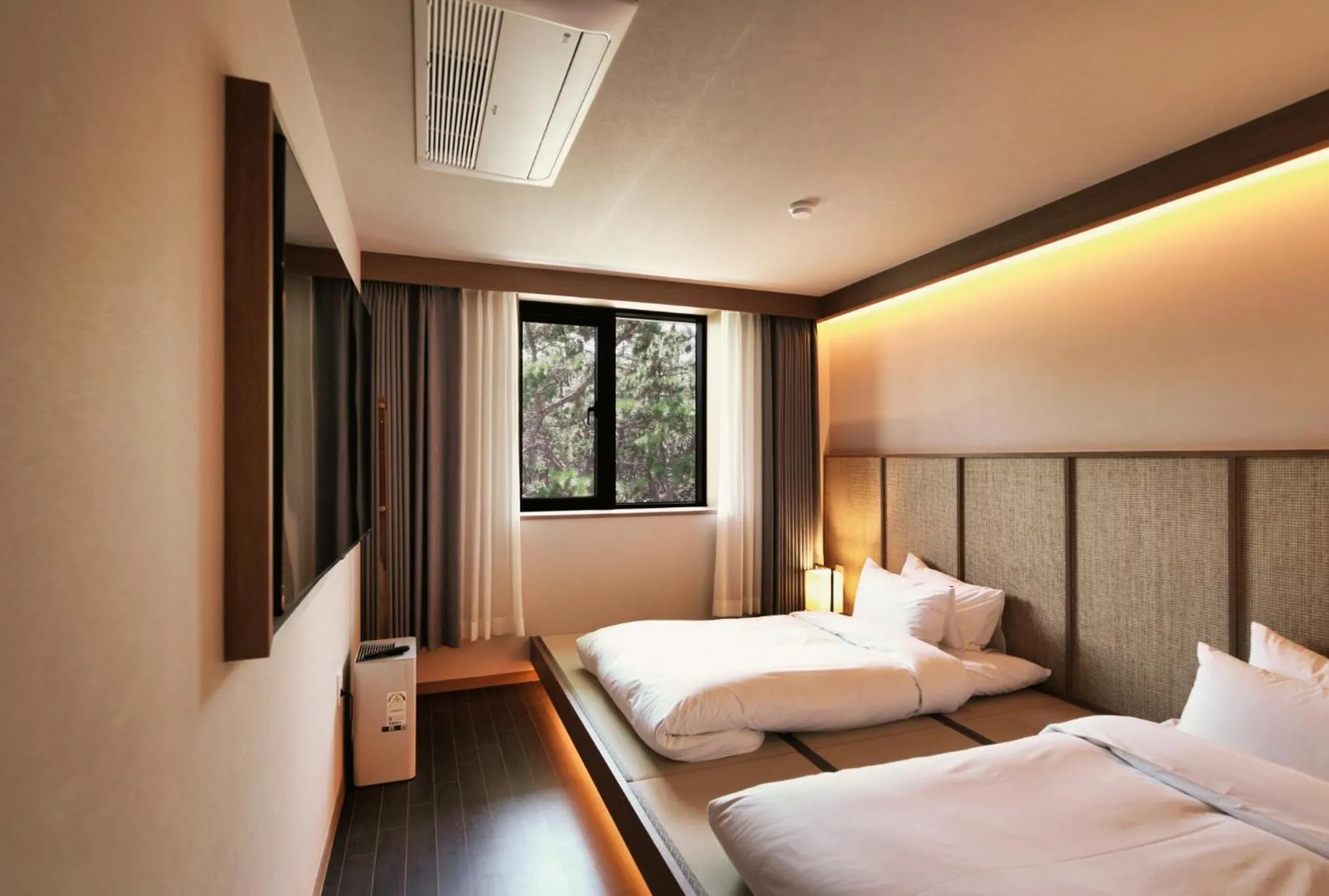 Bed in Gyeongju Denbasta Ryokan