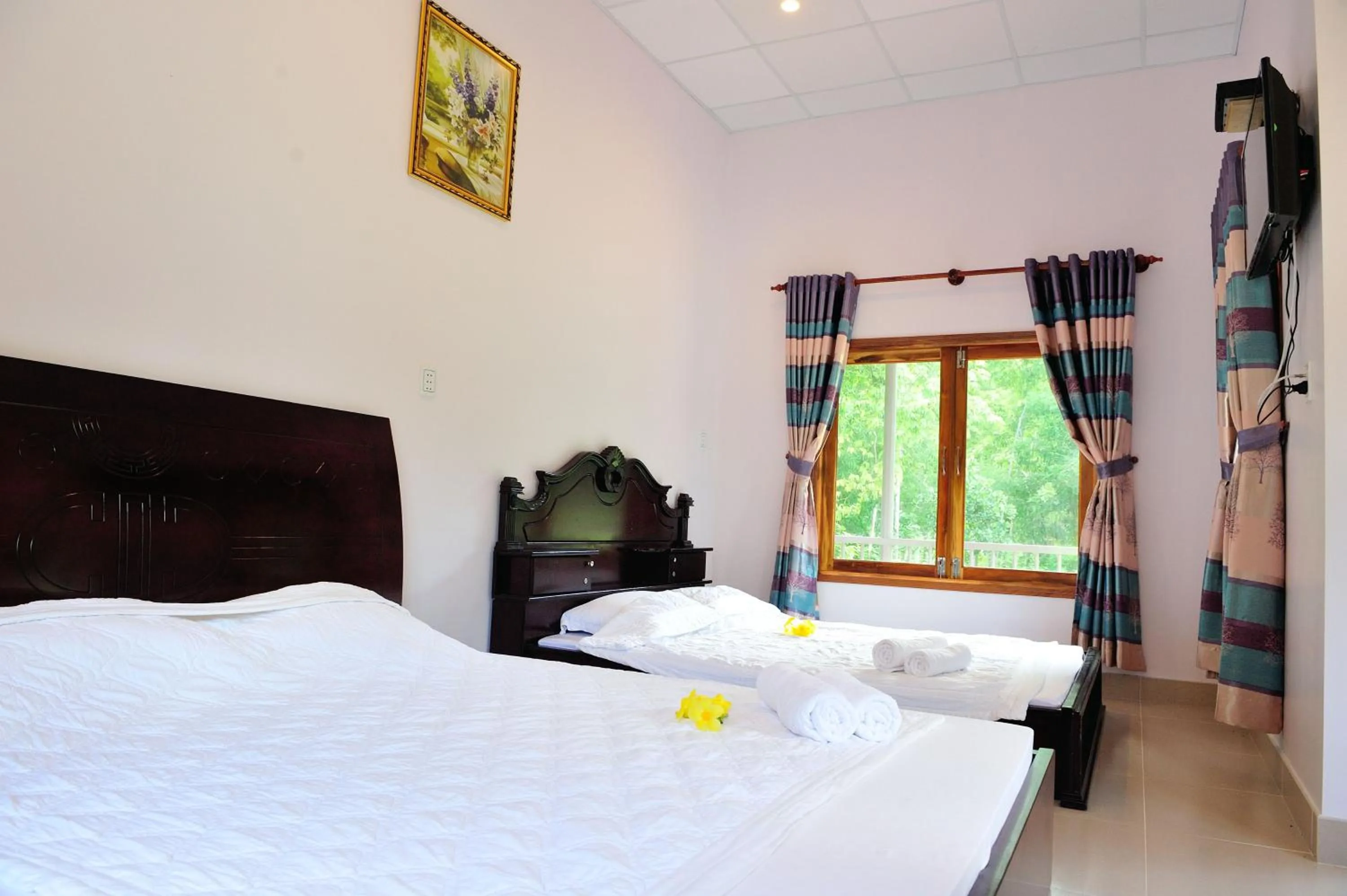 Bed in Tang Thanh Phat Resort