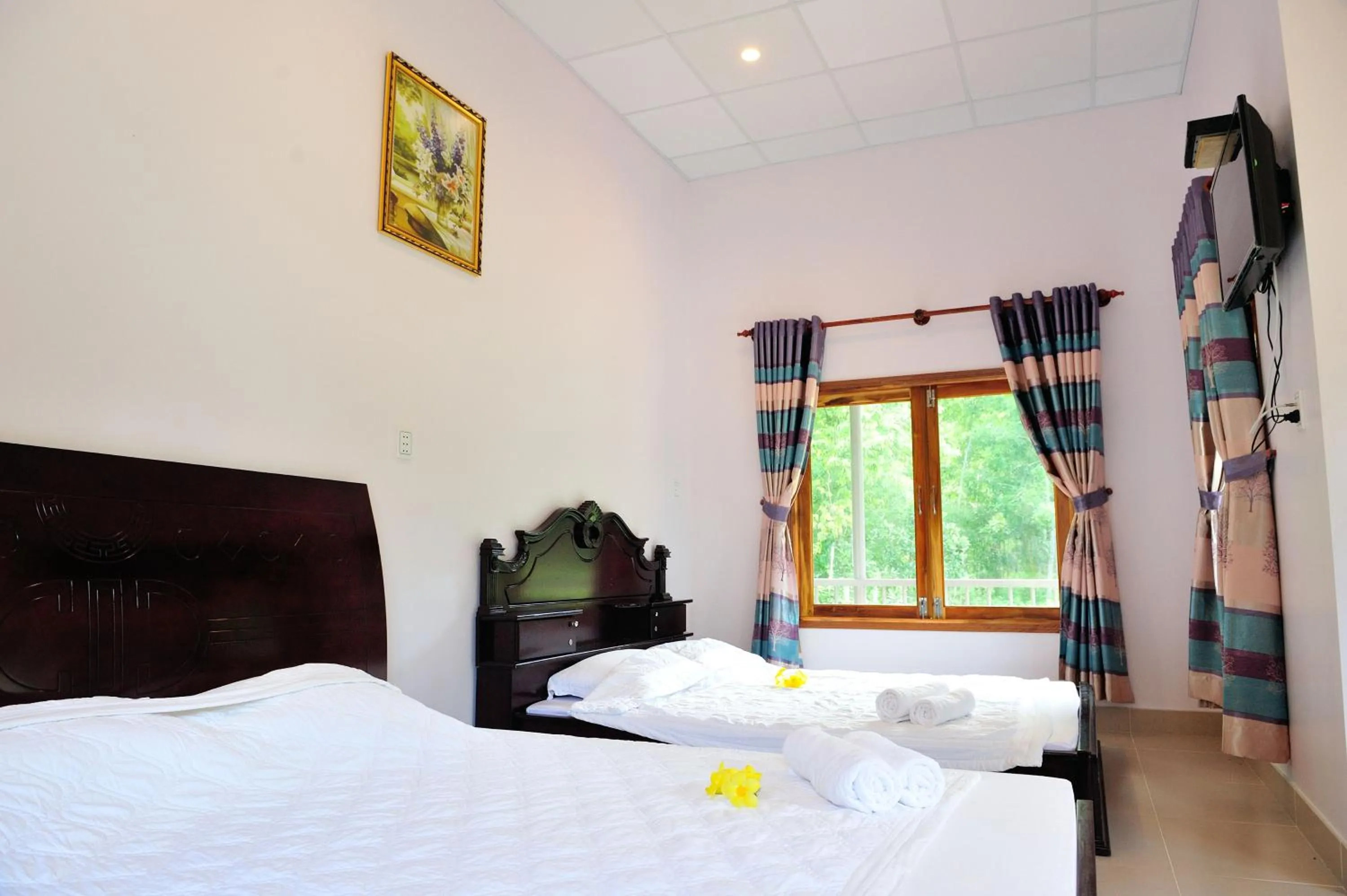 Bed in Tang Thanh Phat Resort