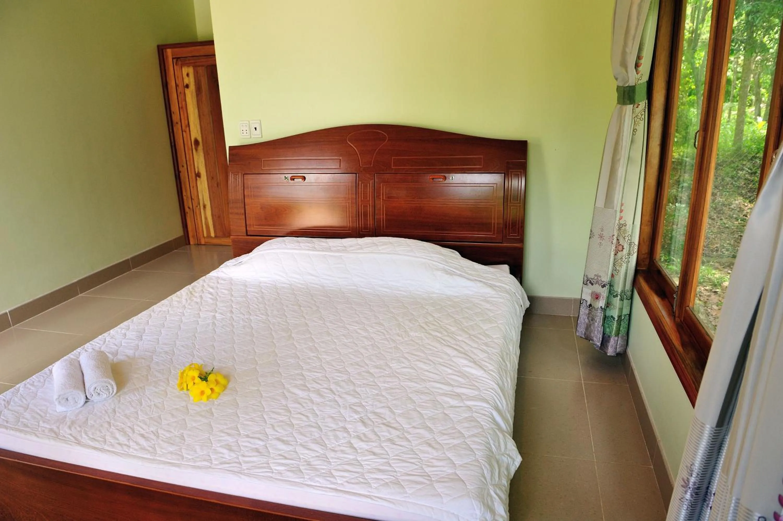 Bed in Tang Thanh Phat Resort