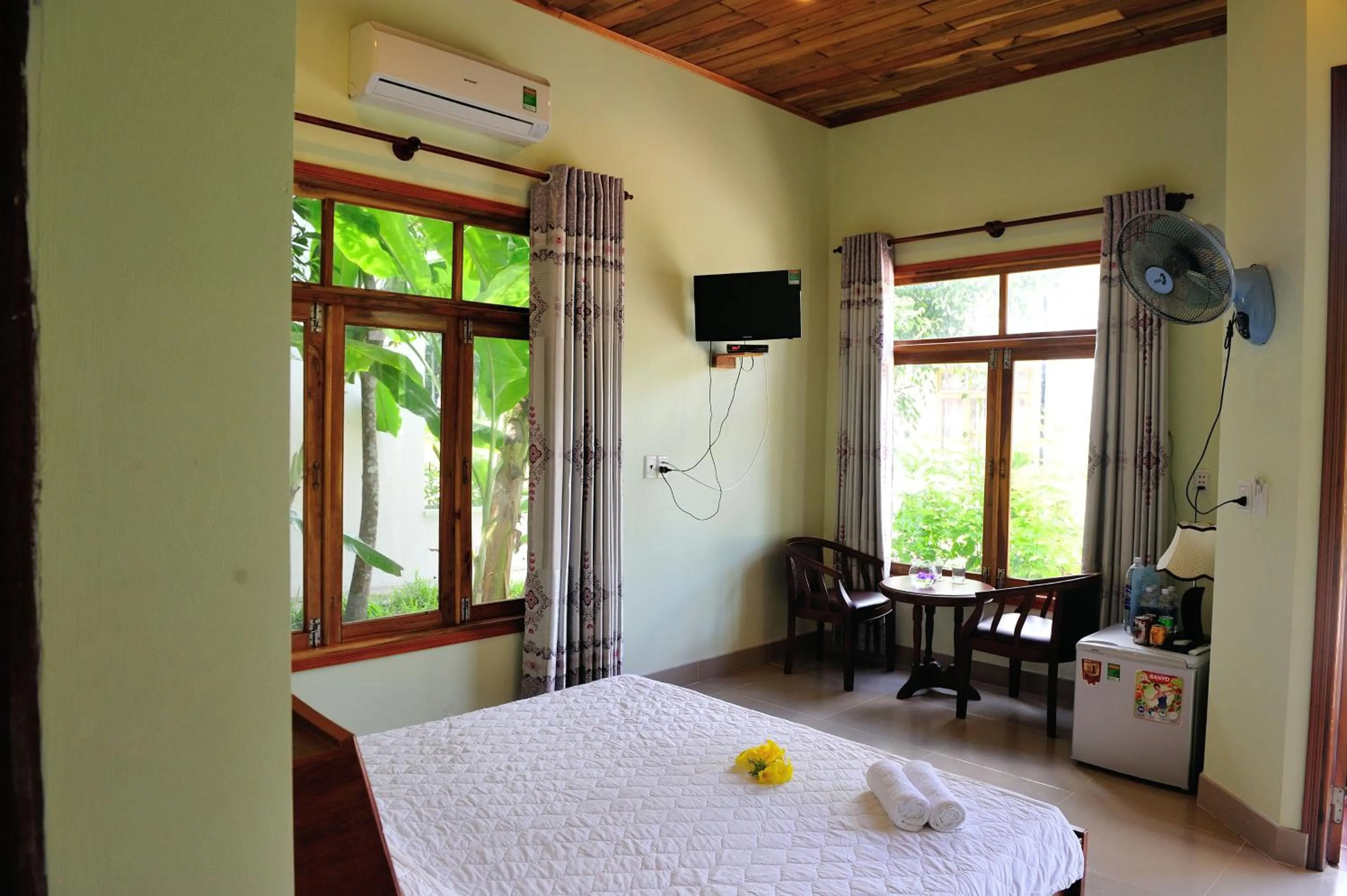 Bed in Tang Thanh Phat Resort