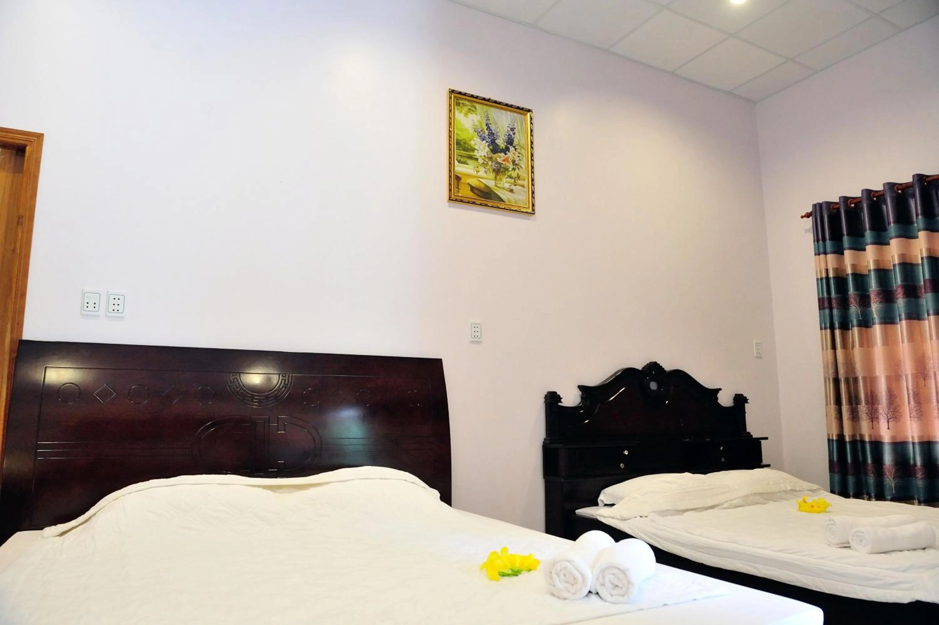 Bed in Tang Thanh Phat Resort