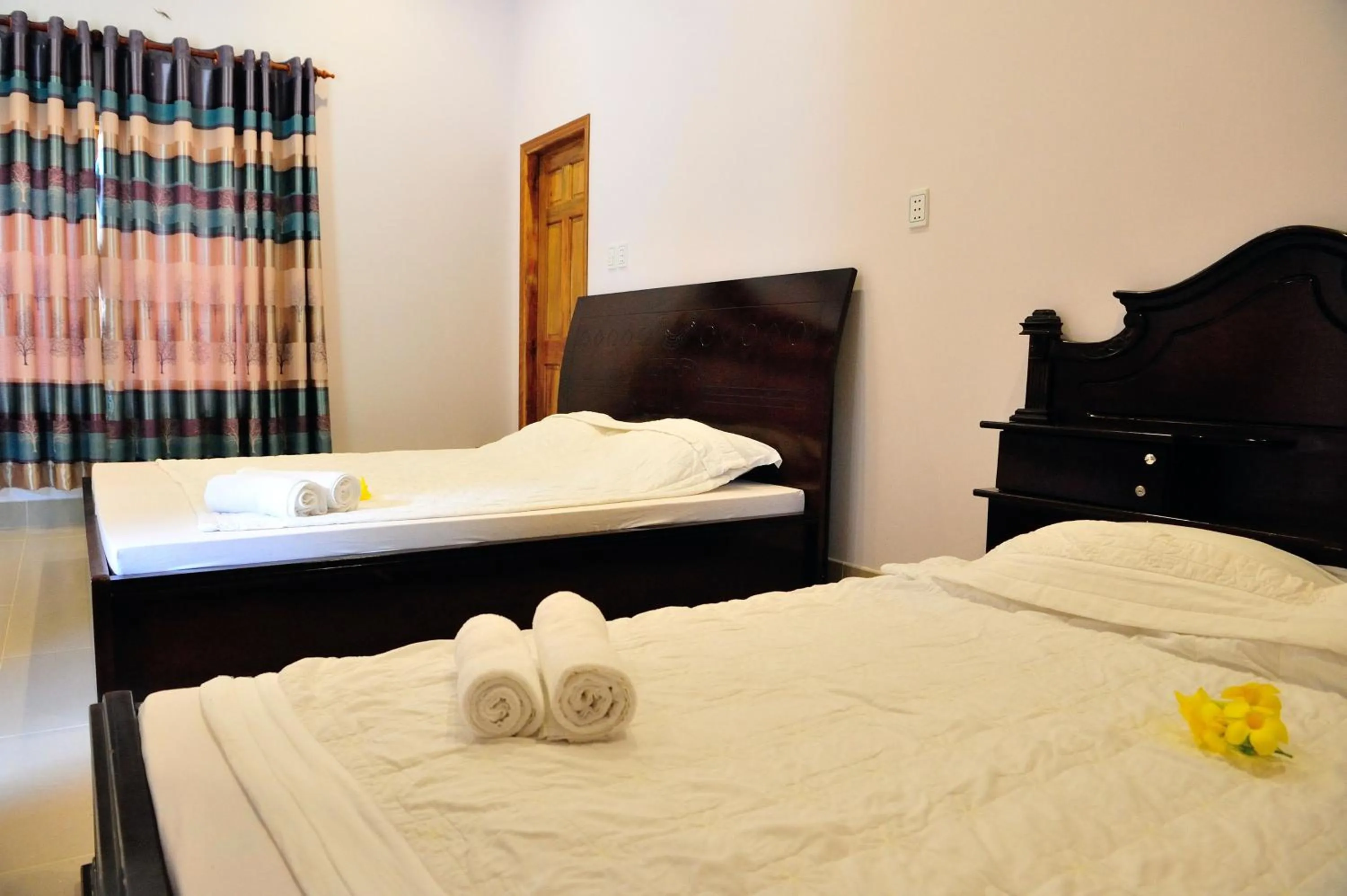 Bed in Tang Thanh Phat Resort