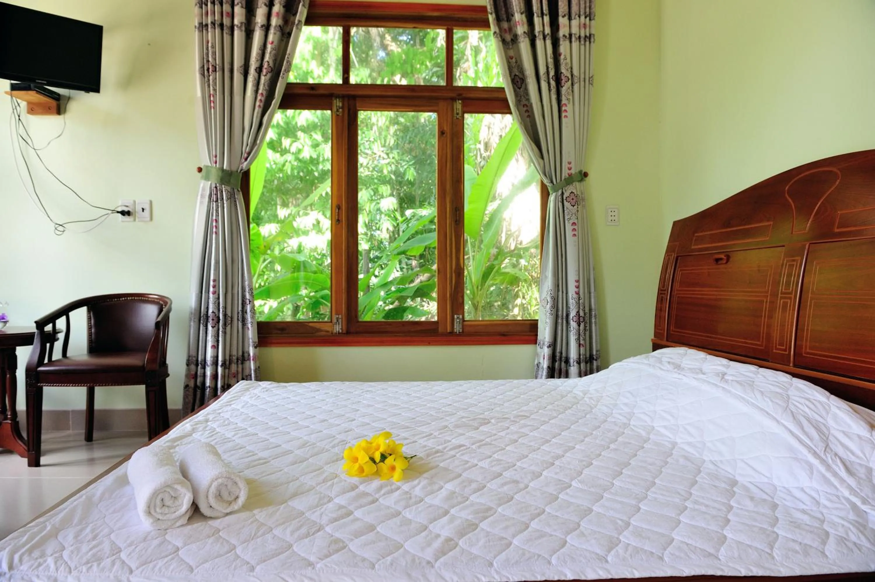 Bed in Tang Thanh Phat Resort