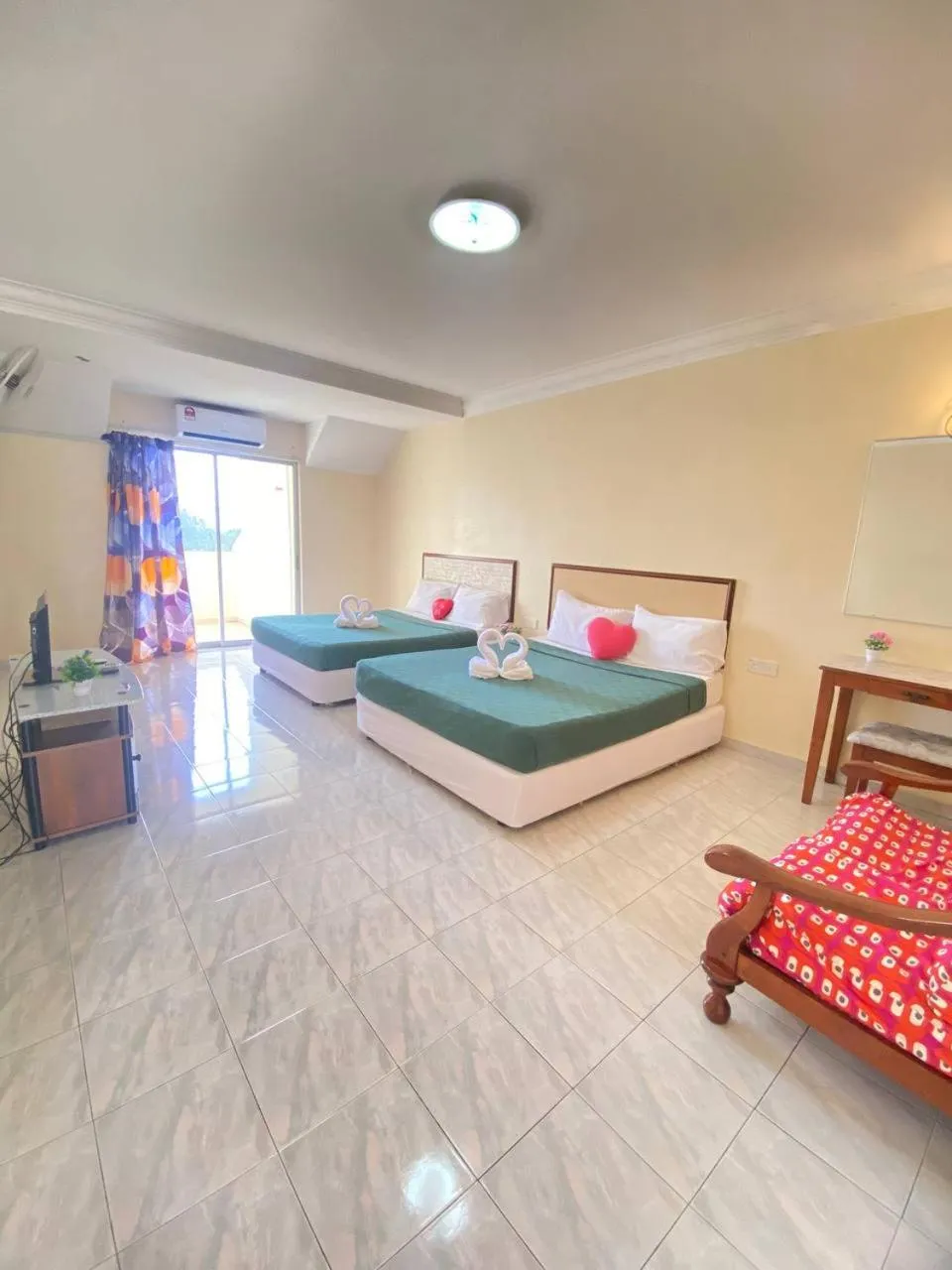 Photo of the whole room, Bed in Teluk Batik Holiday Apartment