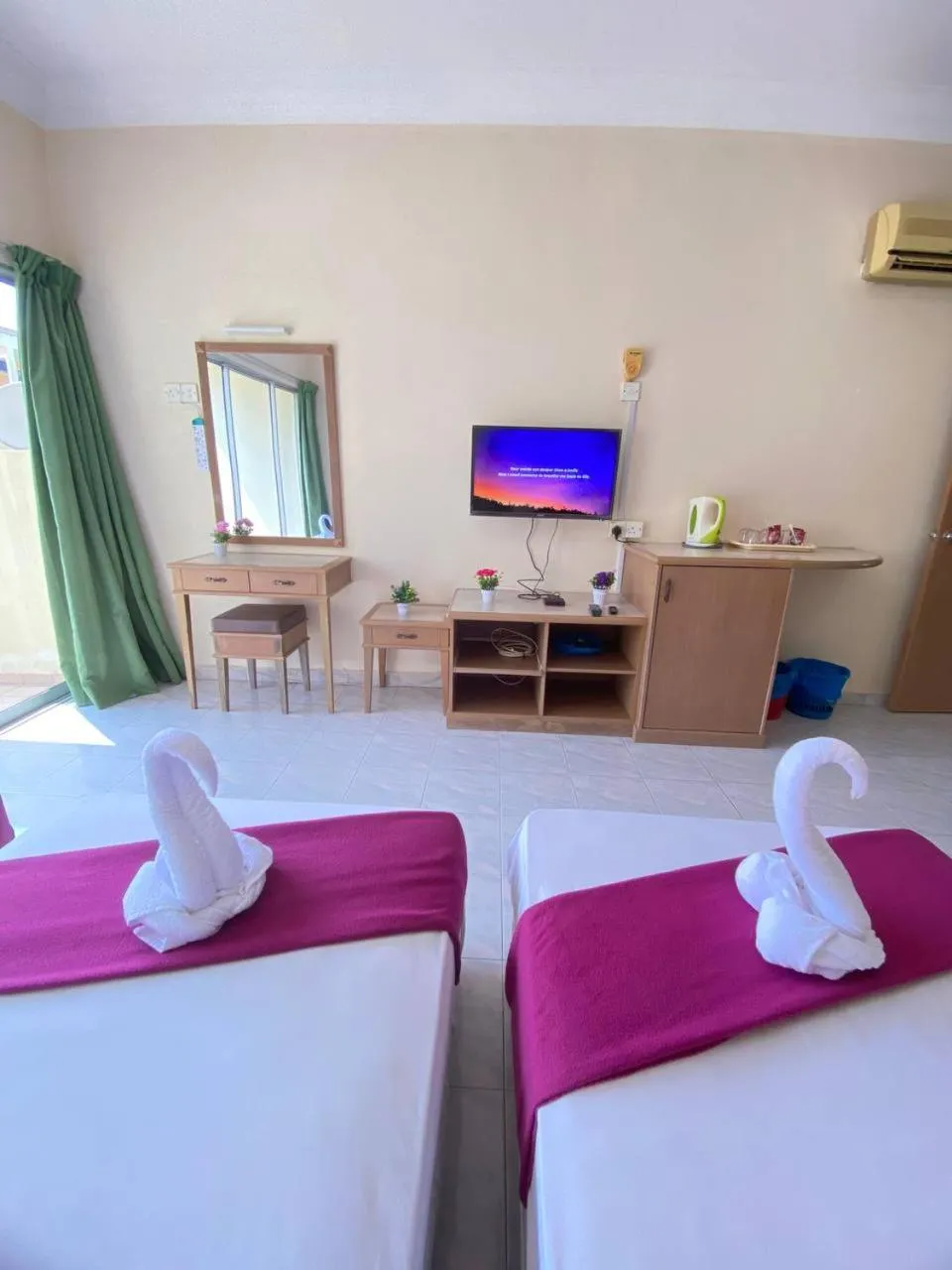 TV and multimedia, Bed in Teluk Batik Holiday Apartment