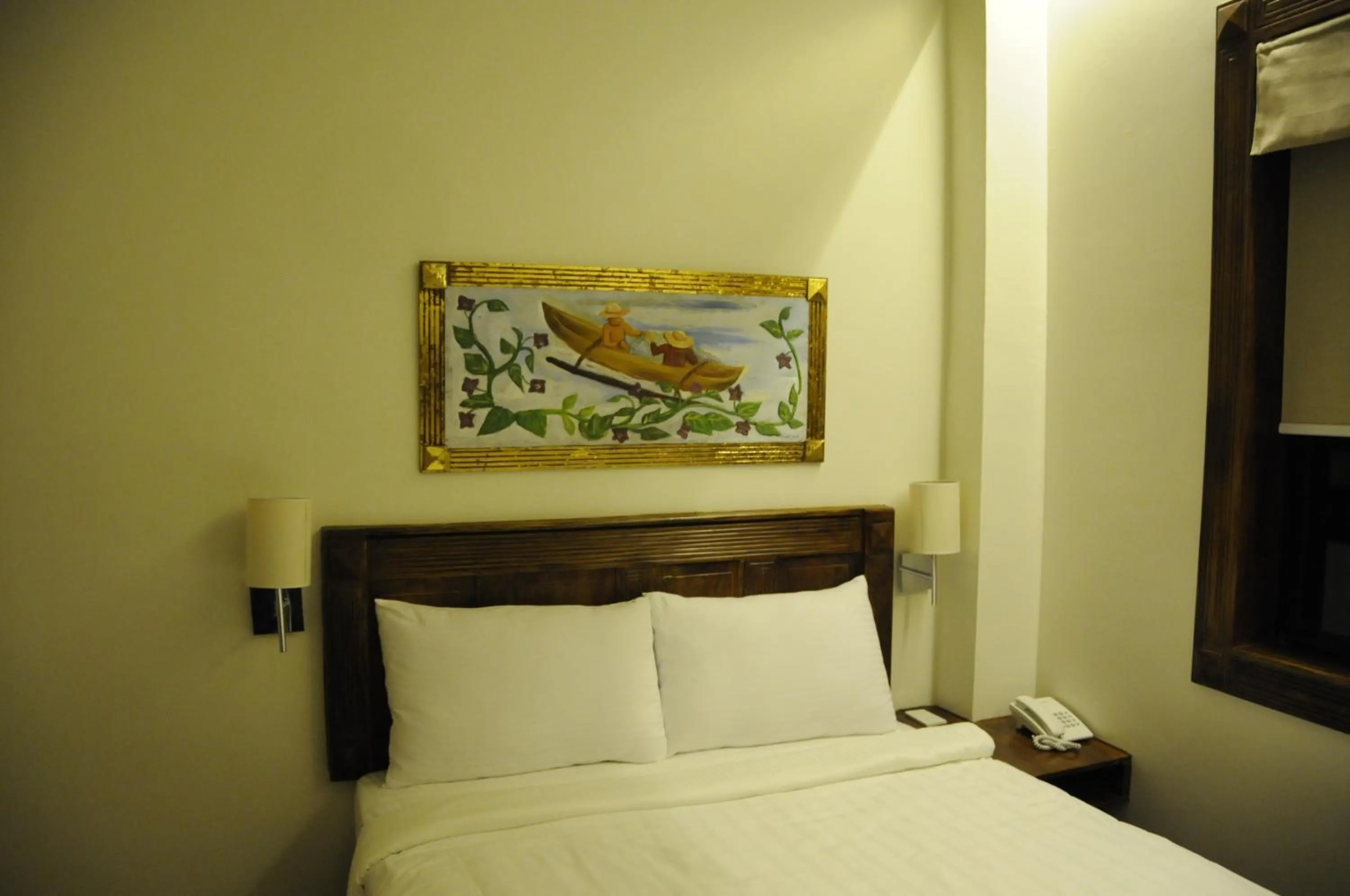 Decorative detail, Bed in Hotel Veneto De Vigan