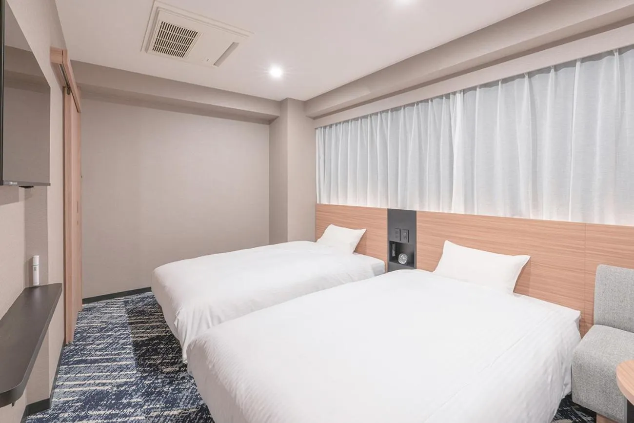 Bed in Washington R&B Hotel Nagoya Sakae Higashi