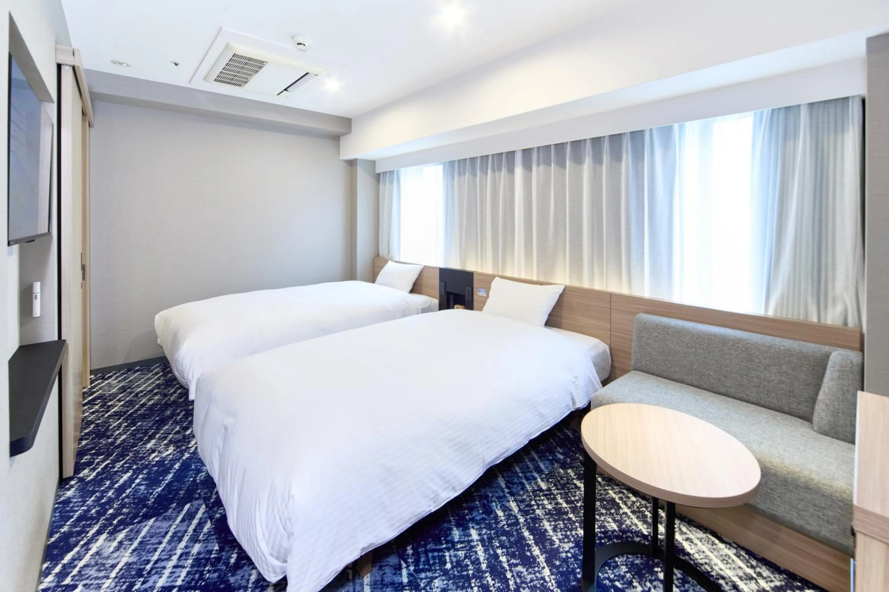 Photo of the whole room, Bed in Washington R&B Hotel Shin Yokohama Ekimae