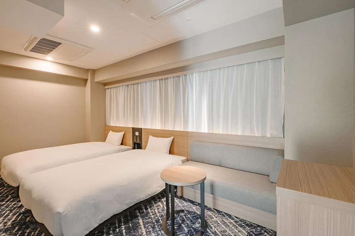 Bed in Washington R&B Hotel Shin Yokohama Ekimae