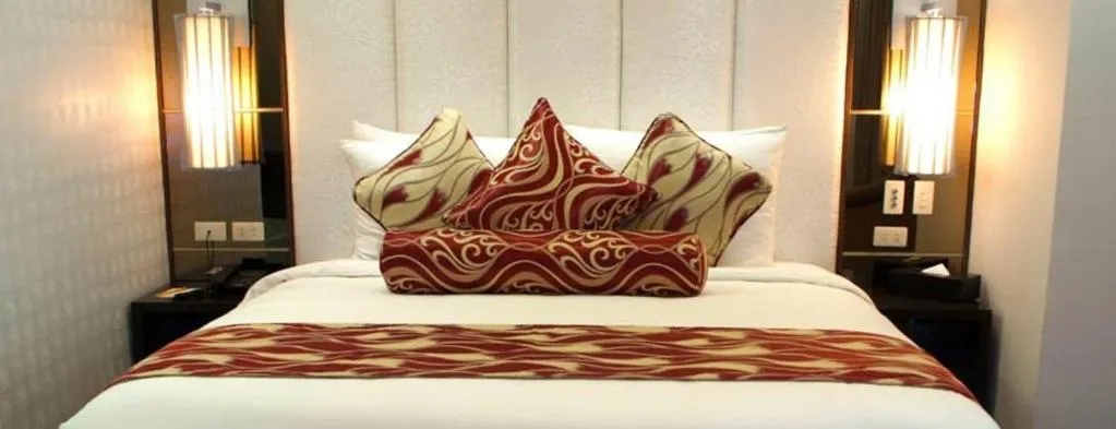 Bed in The Penthouse Hotel and Residences