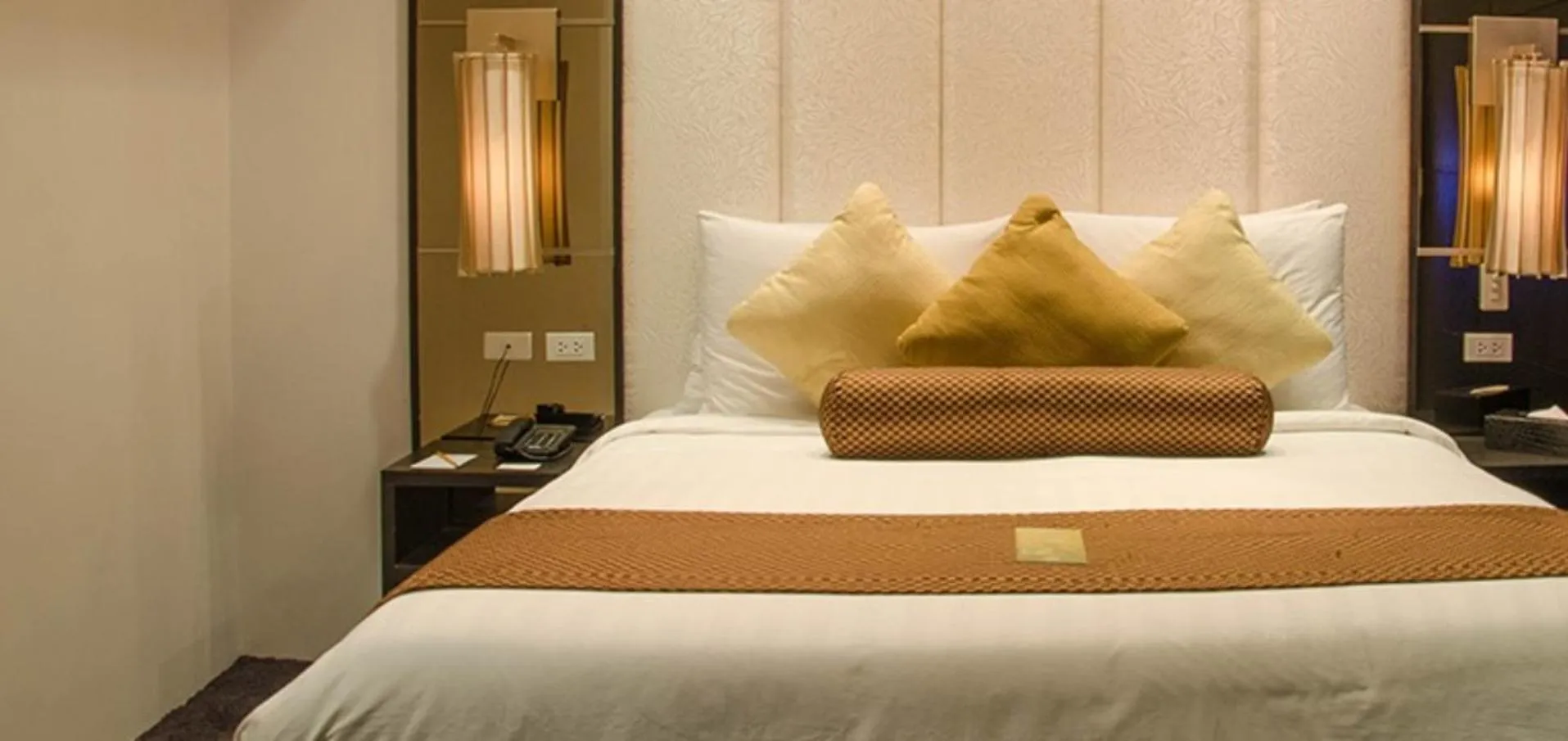 Bed in The Penthouse Hotel and Residences