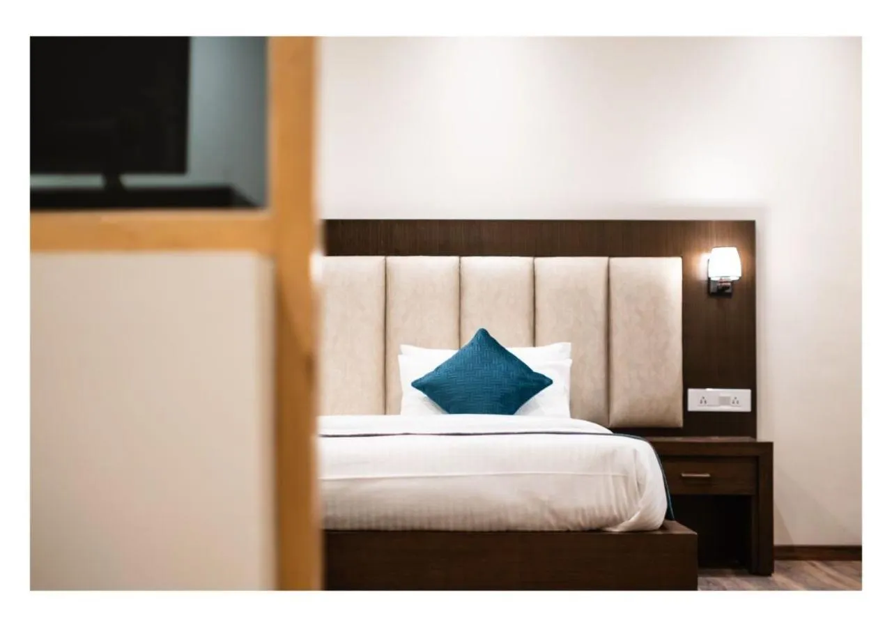 Bed in Hotel Kharu Vilaasa