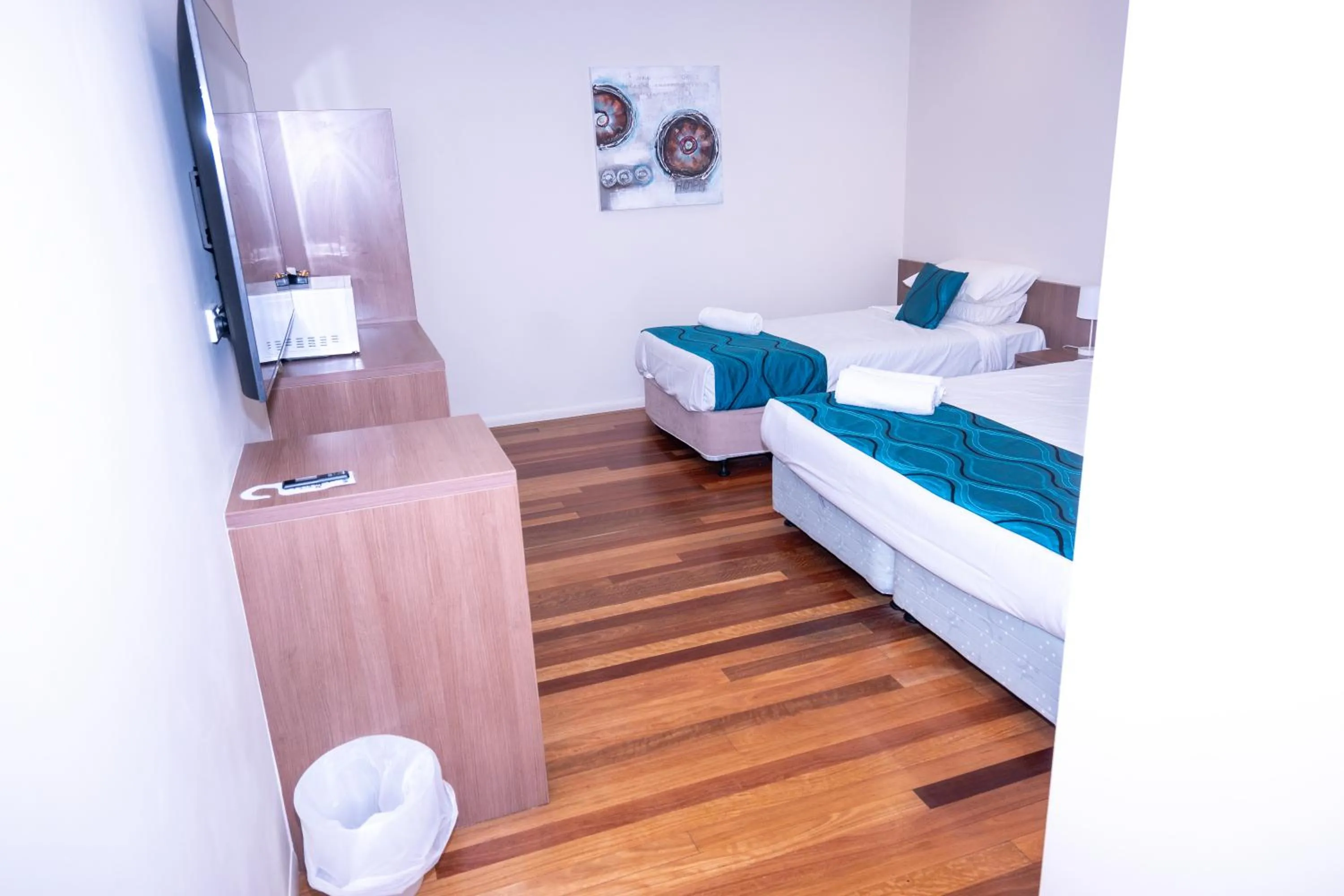 Bed in The Australian Hotel Motel