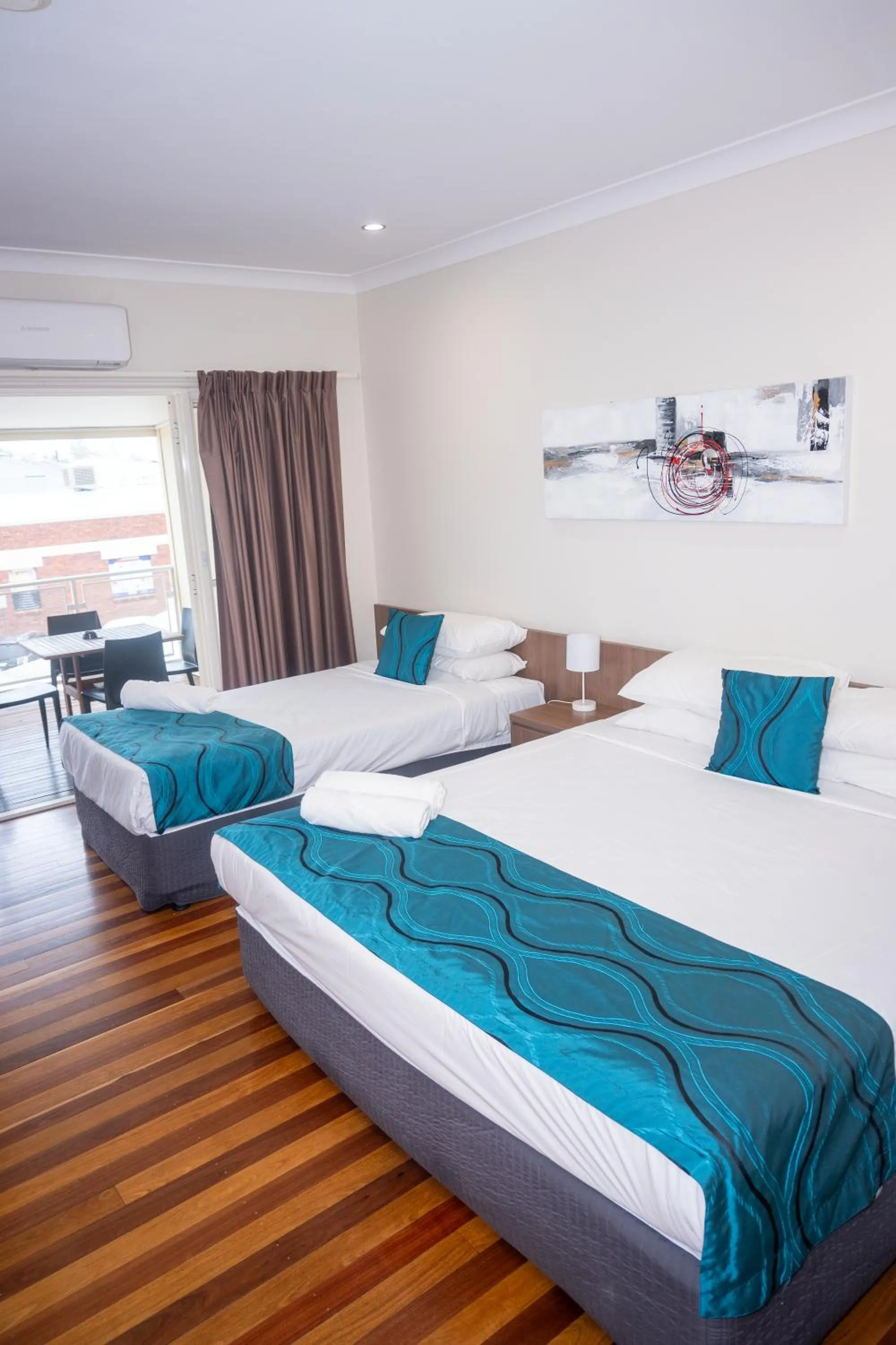 Bed in The Australian Hotel Motel