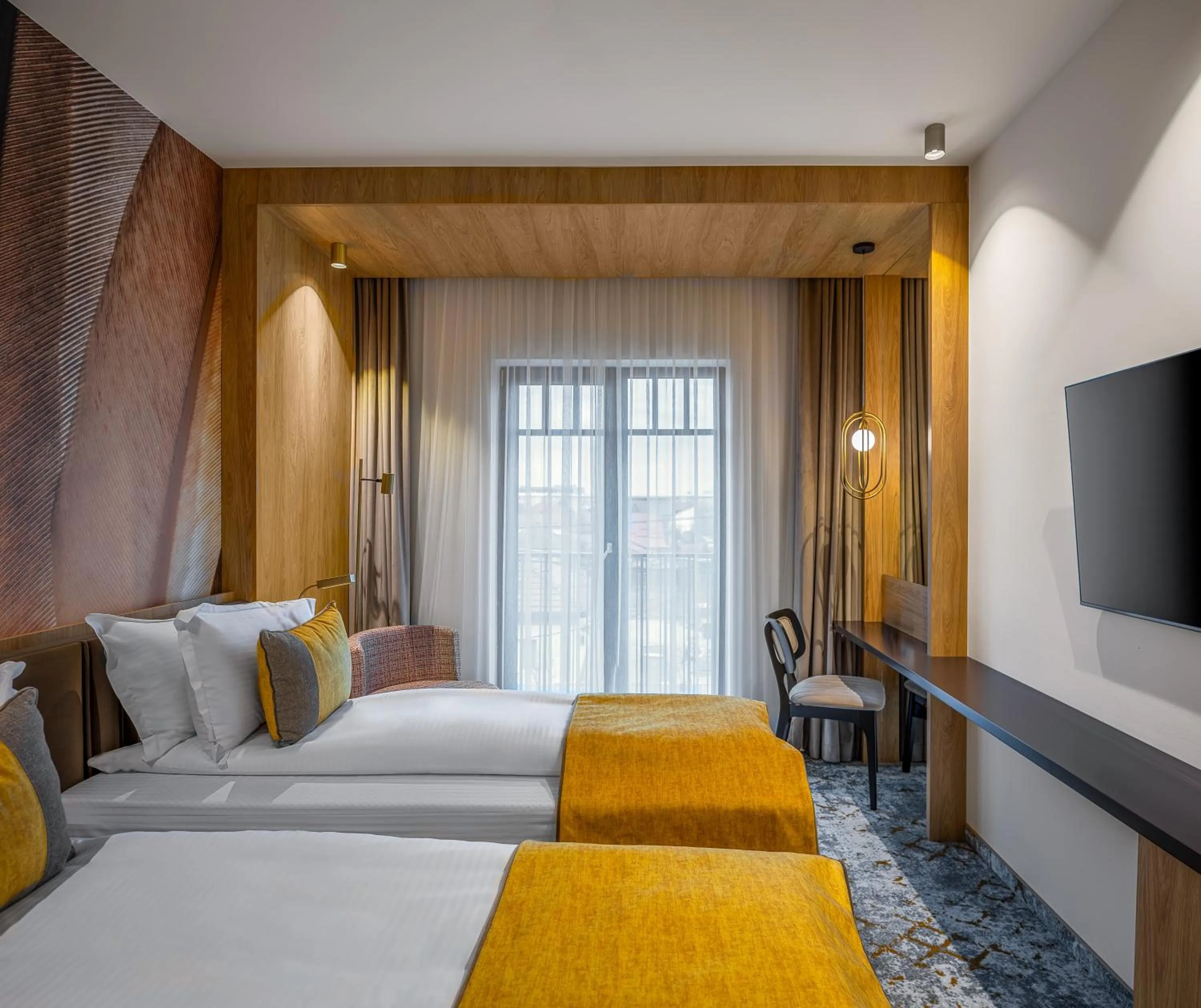 Communal lounge/ TV room, Bed in Hotel Branco Timisoara