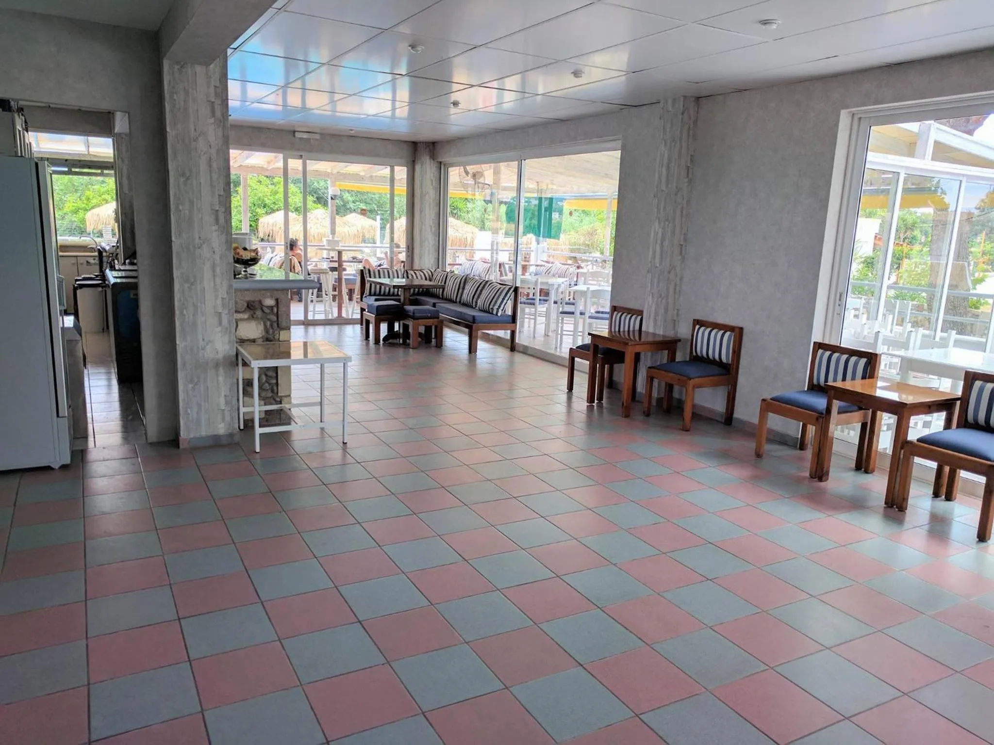 Communal lounge/ TV room in Blue Nest Hotel