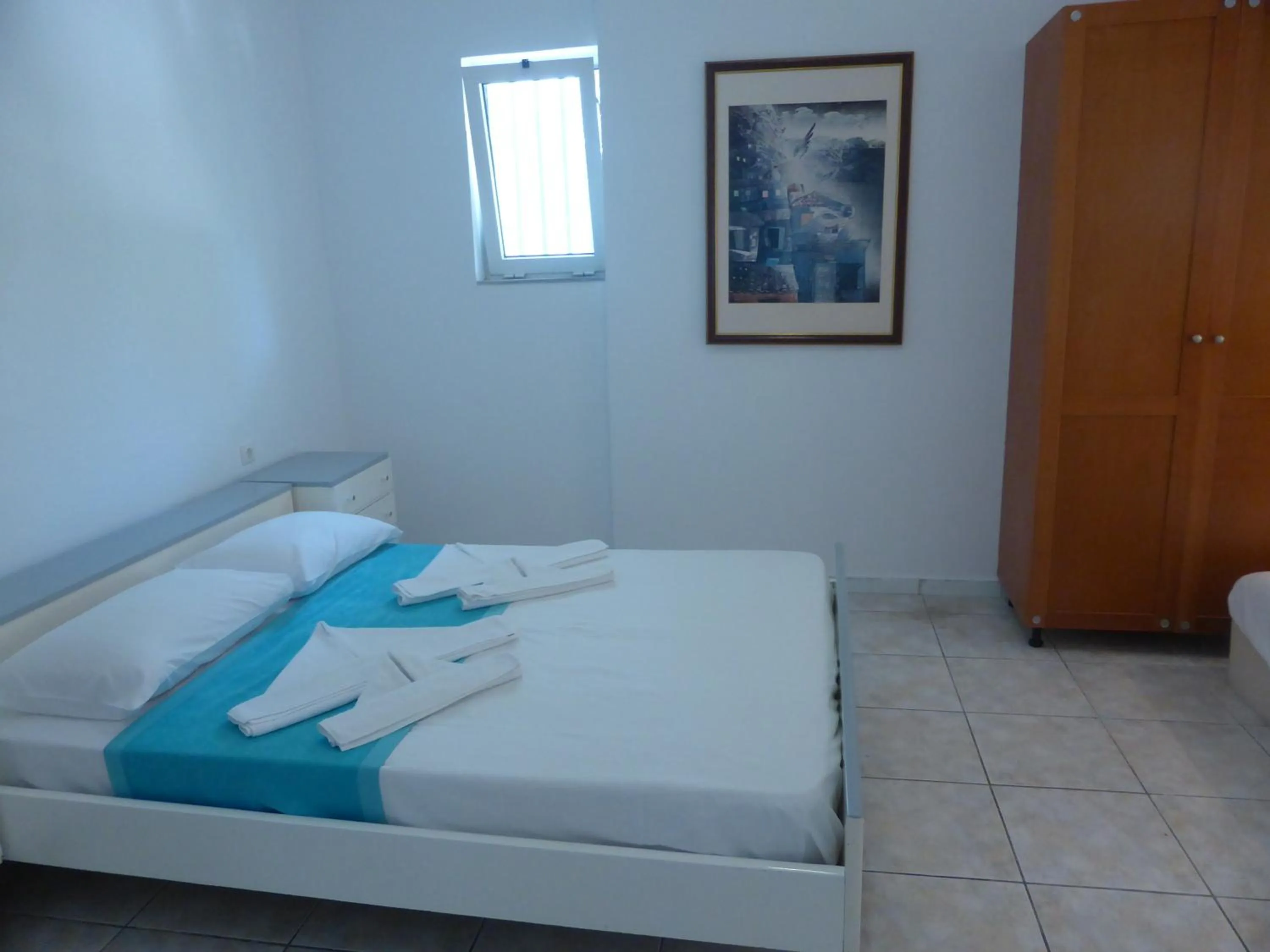 Bedroom in Blue Nest Hotel