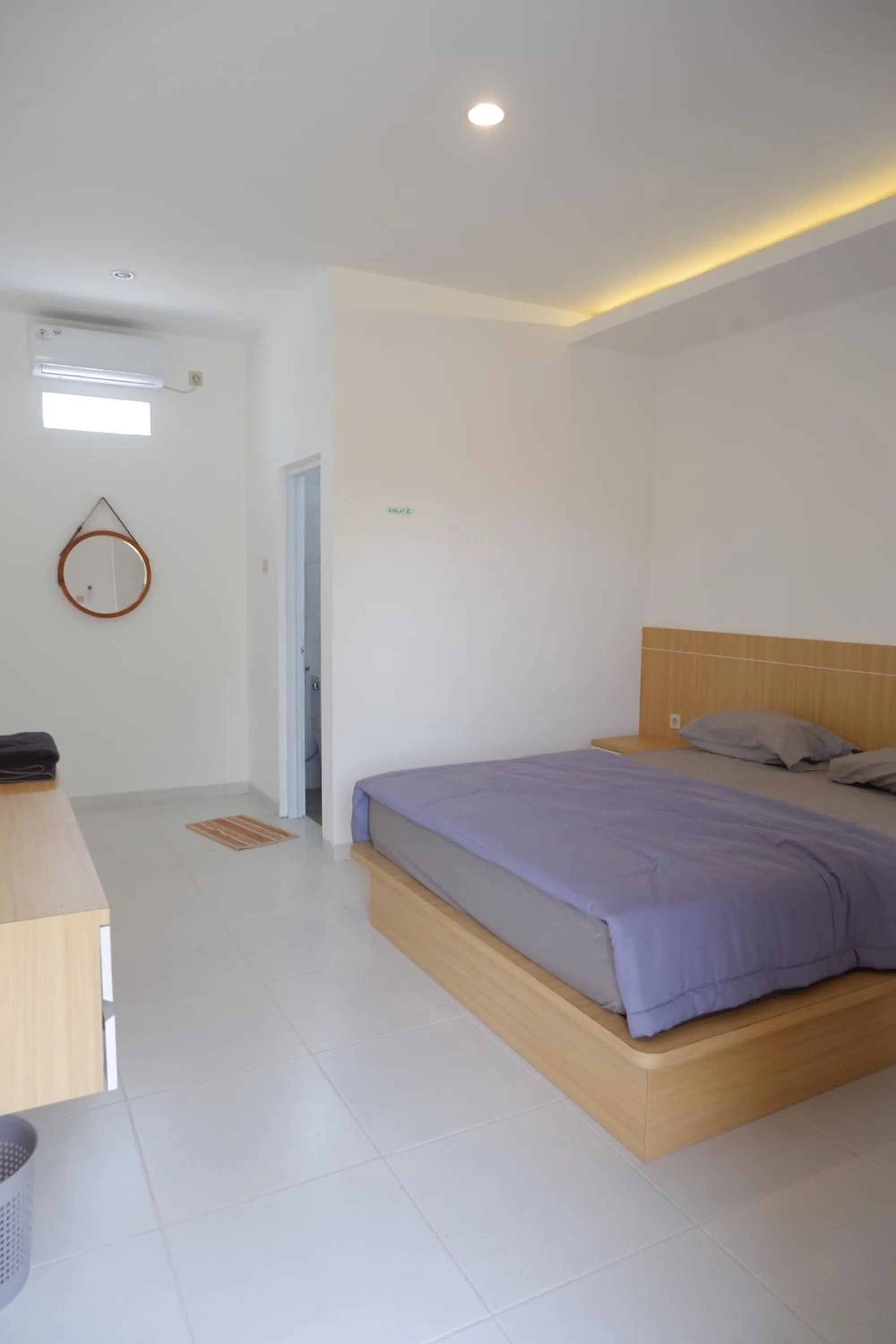 Bed in Homestay Joglo Seruni Syariah