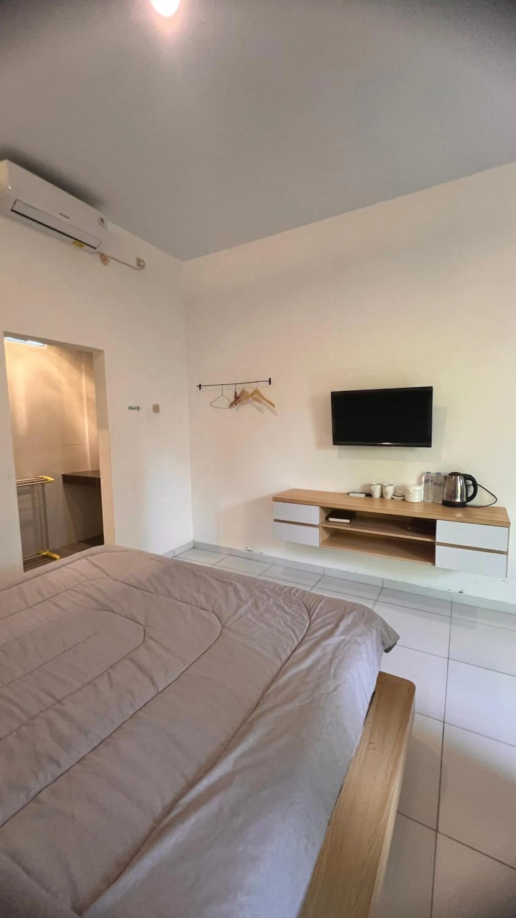 Bed in Homestay Joglo Seruni Syariah