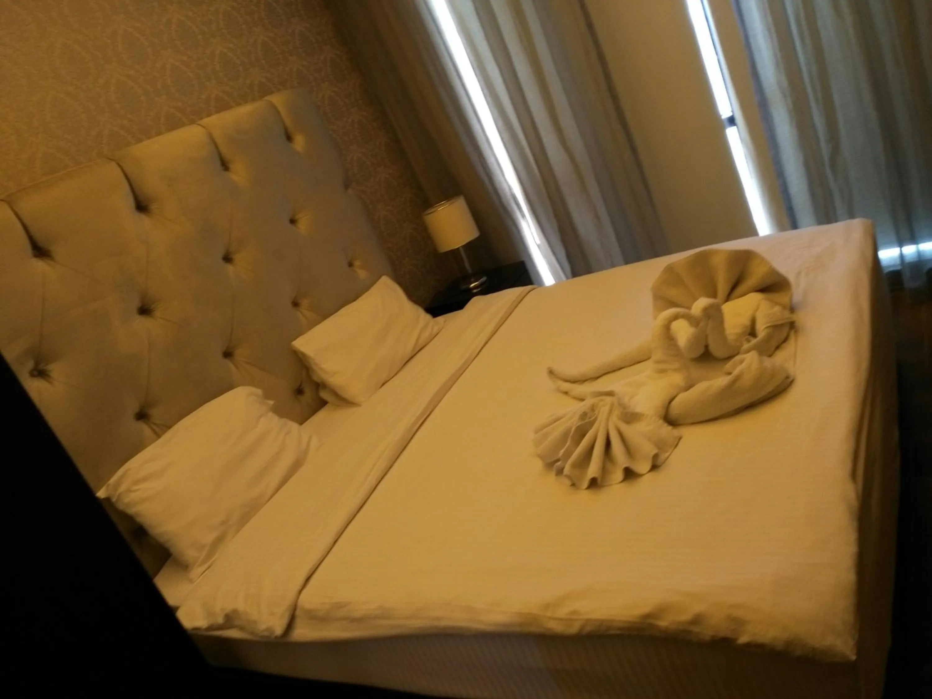 Bedroom, Bed in Nadine Hotel Suites