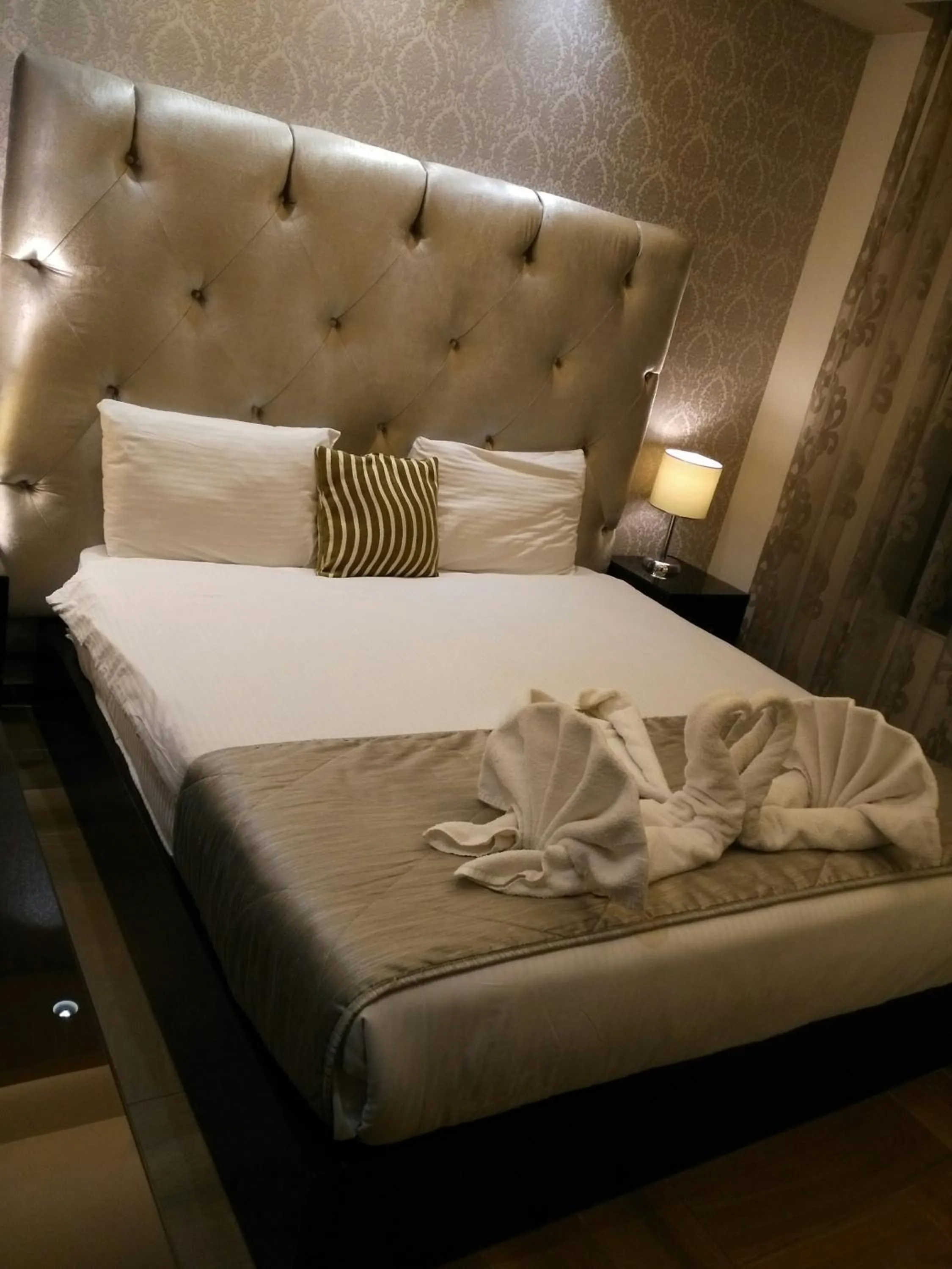 Bedroom, Bed in Nadine Hotel Suites