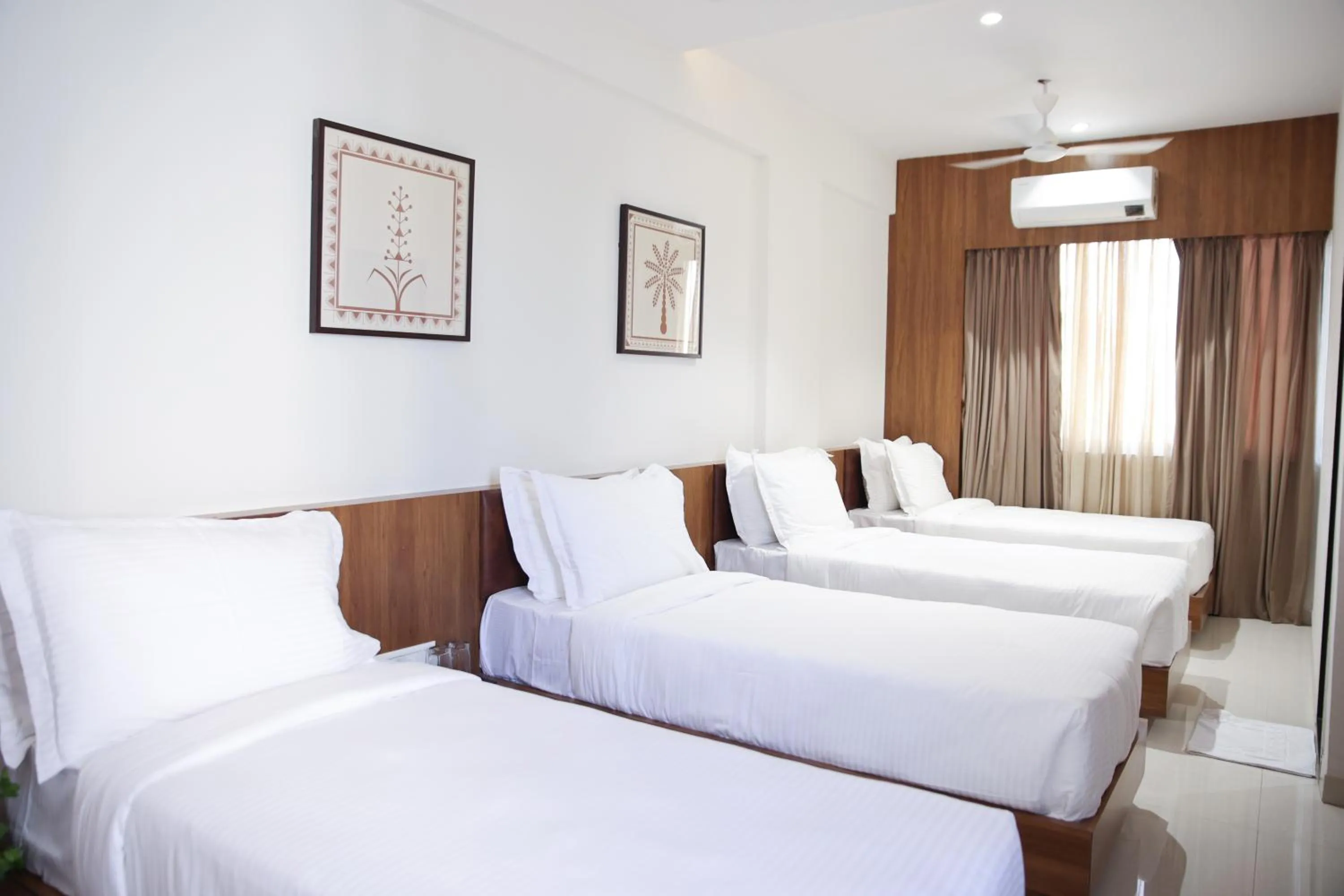 Bed in Lords Eco Inn, Ambaji