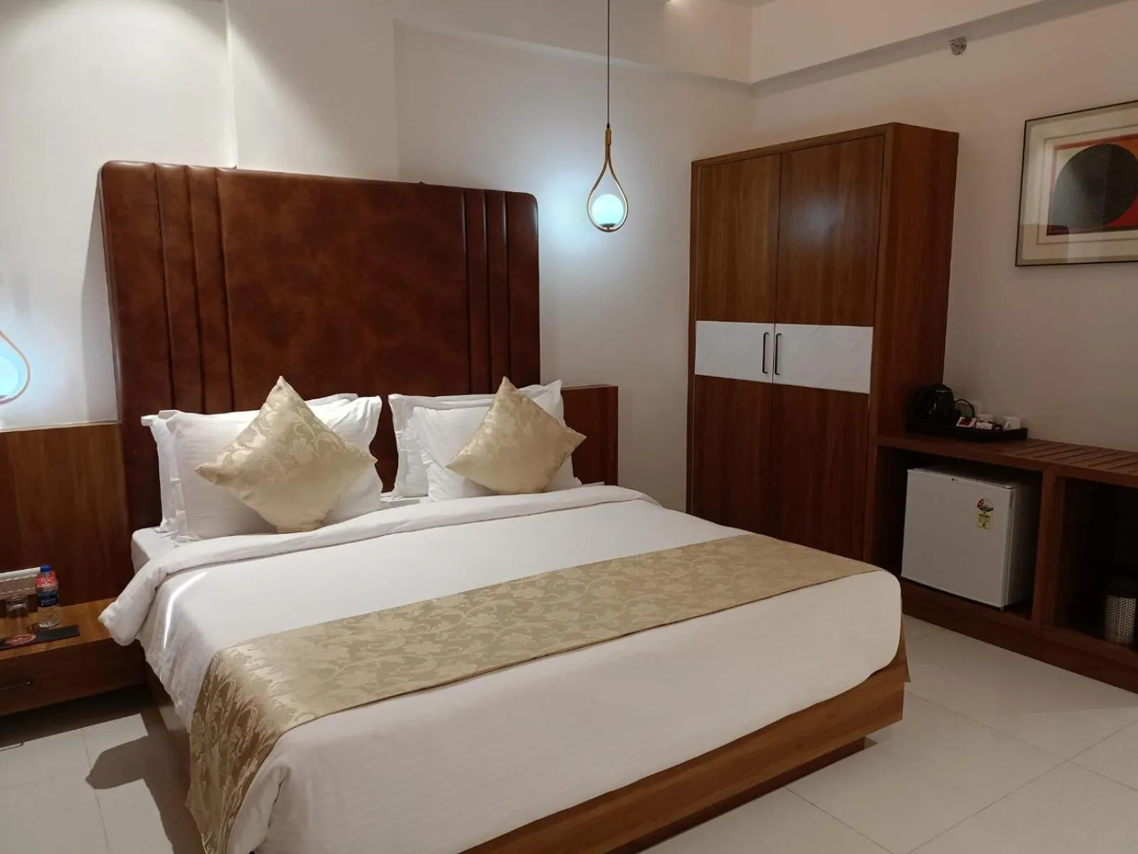 Bed in Lords Eco Inn, Ambaji