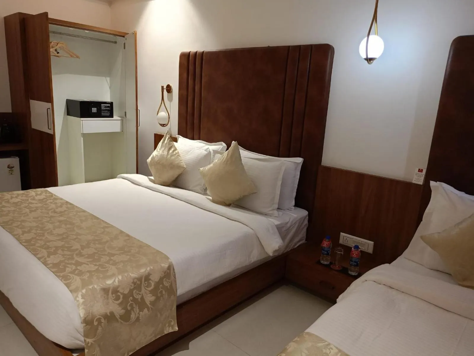 Bed in Lords Eco Inn, Ambaji