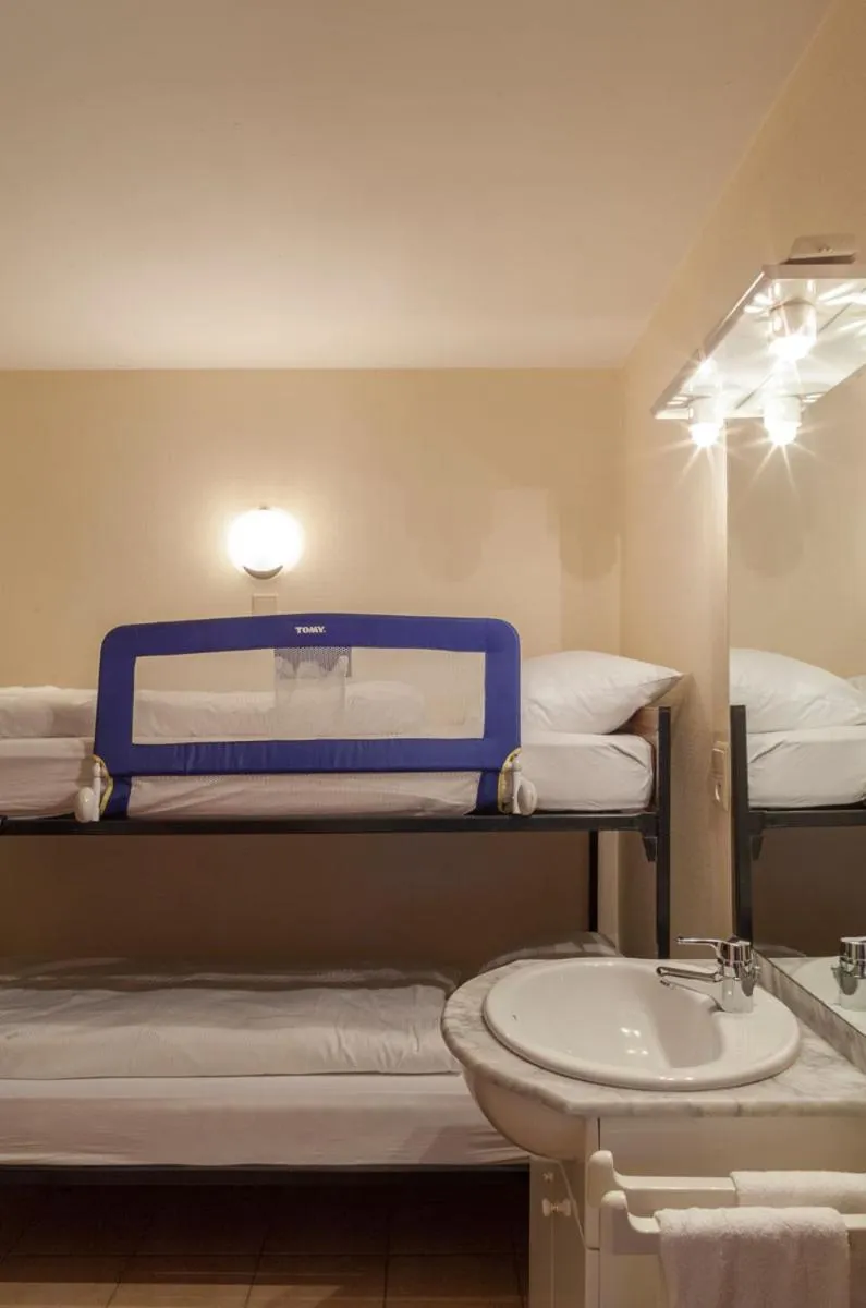 Bed in Hotel Du Soleil