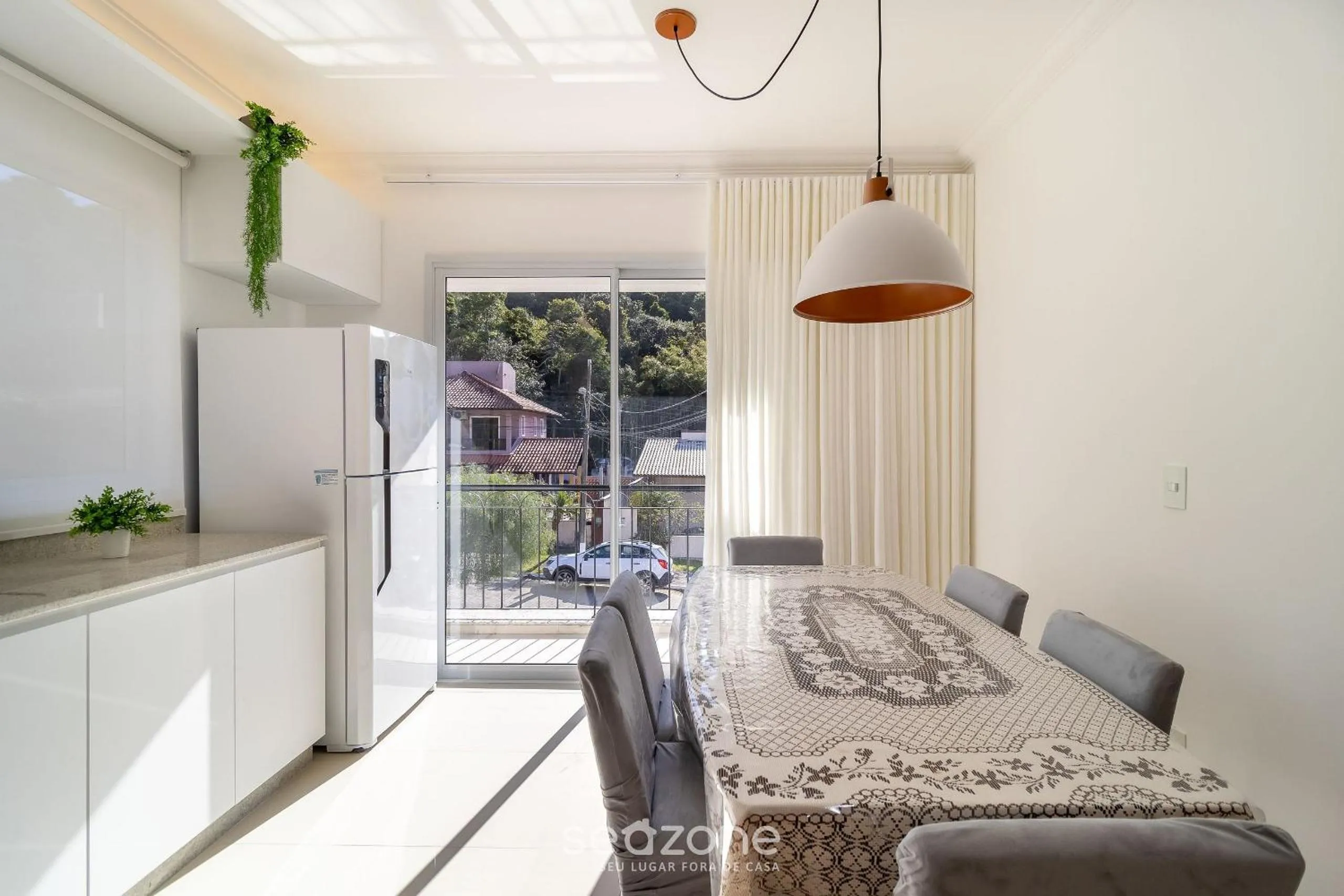 Dining area in Lindo apto com churrrasqueira em Floripa IBE104