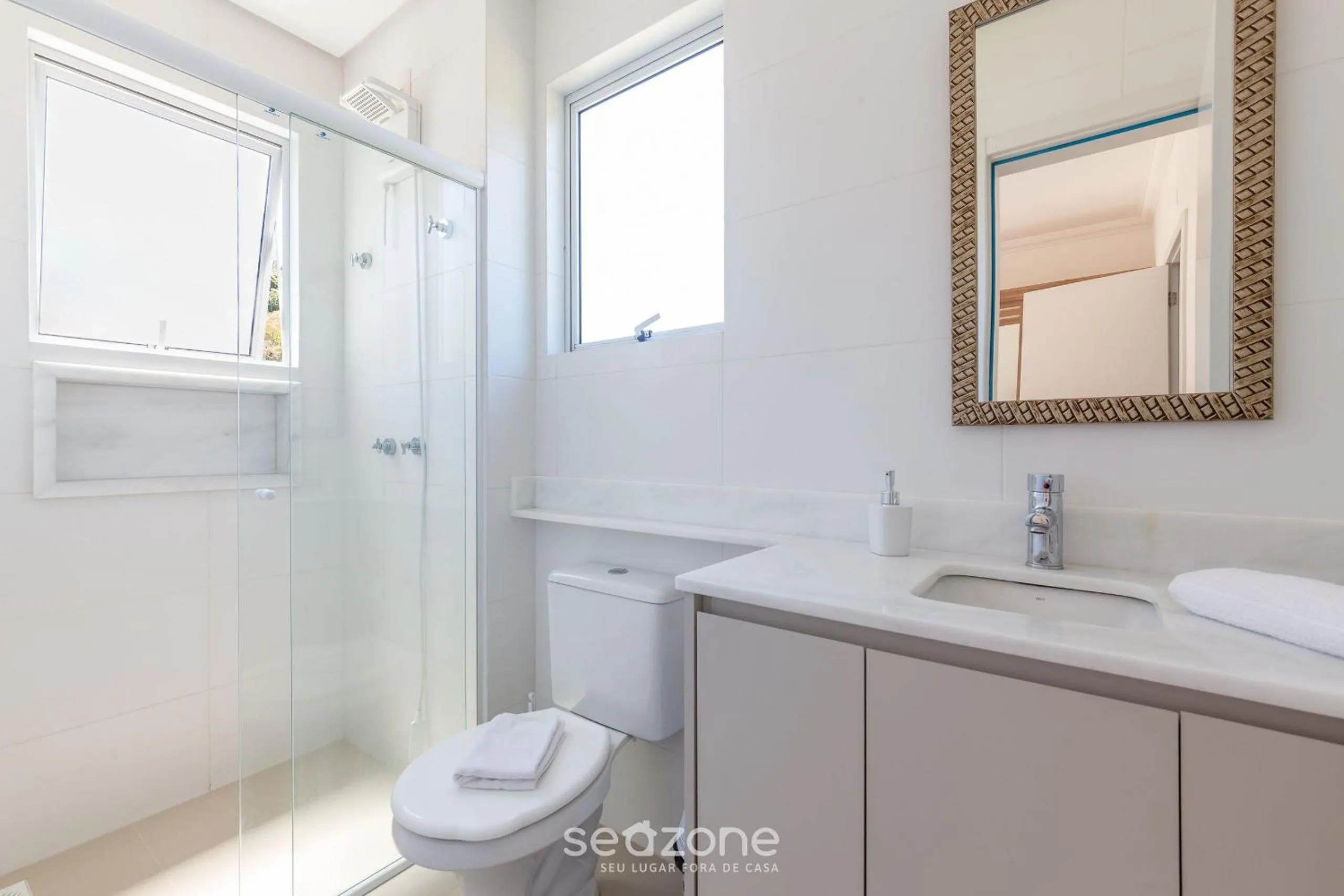 Bathroom in Lindo apto com churrrasqueira em Floripa IBE104