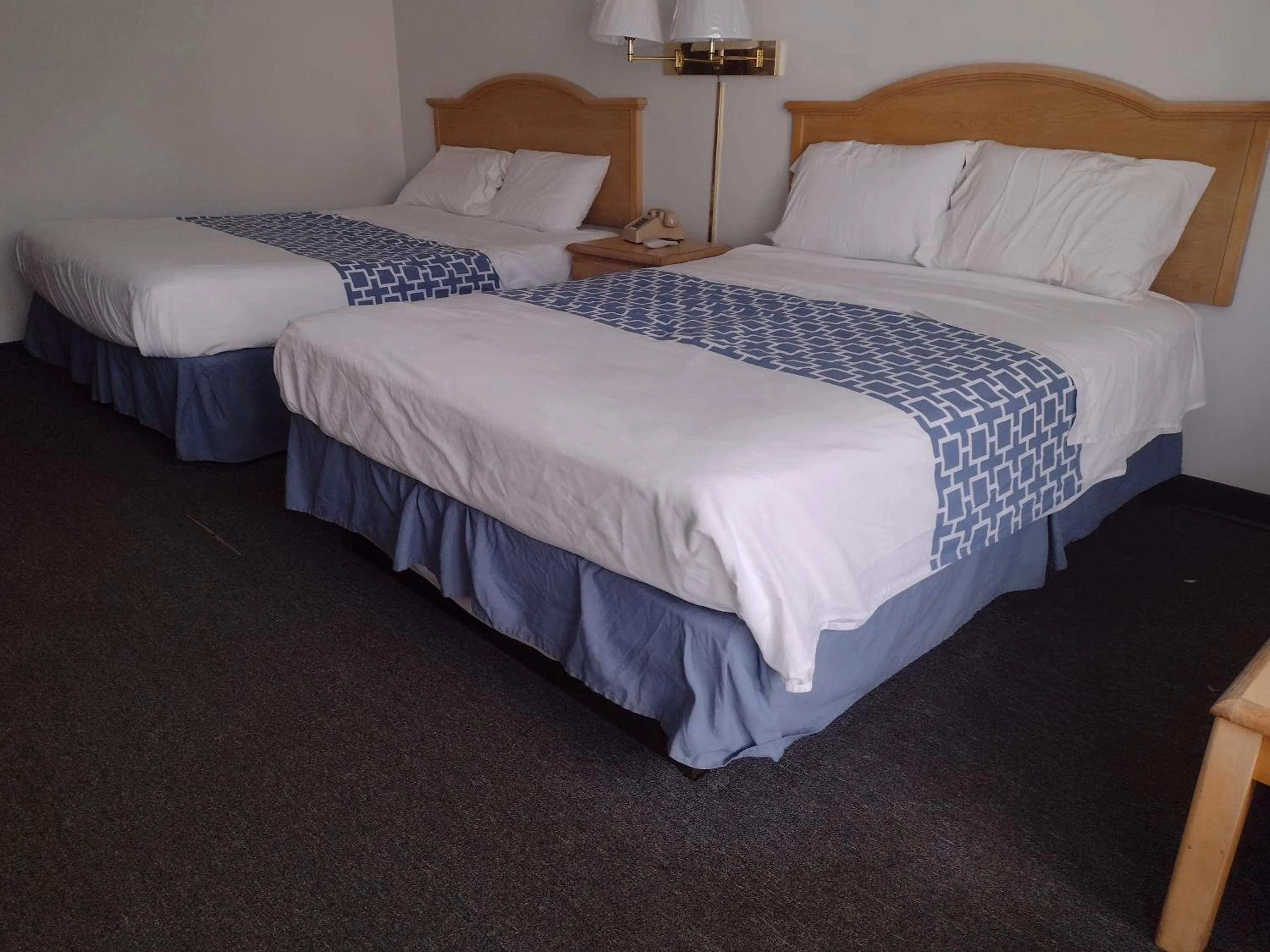 Bed in Wind Chase Inn