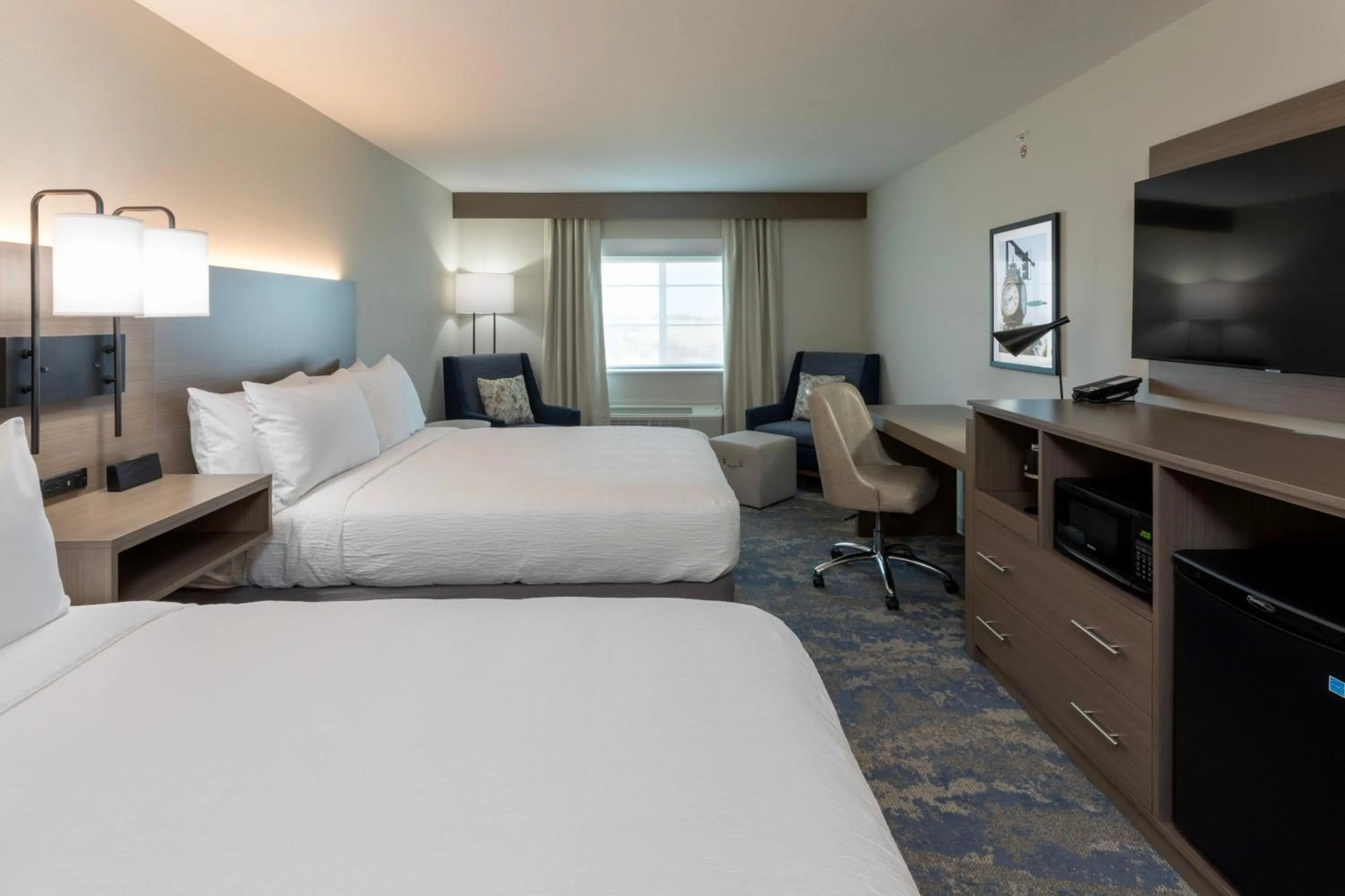 Bed in GrandStay Hotel & Suites Algona