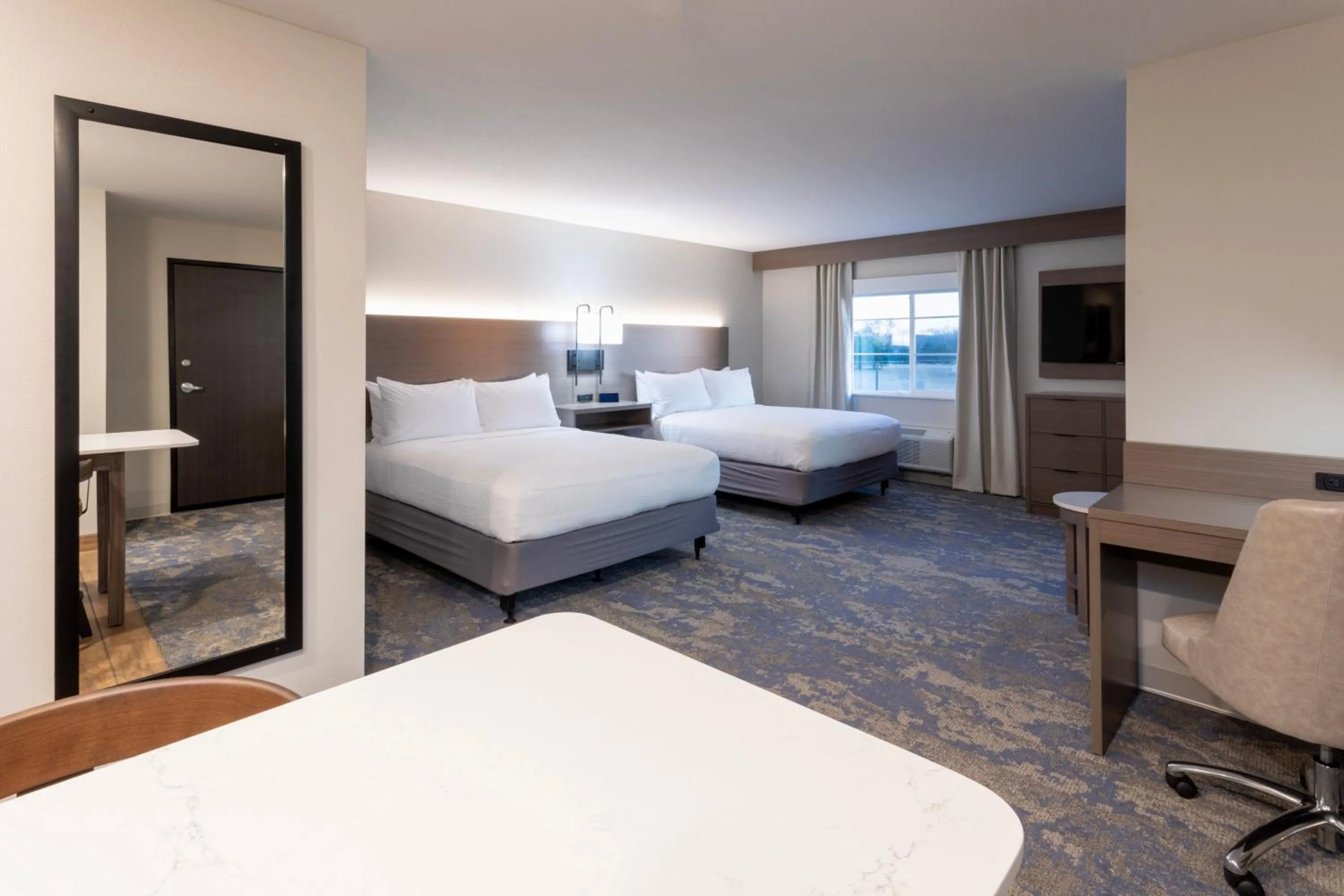 Bed in GrandStay Hotel & Suites Algona