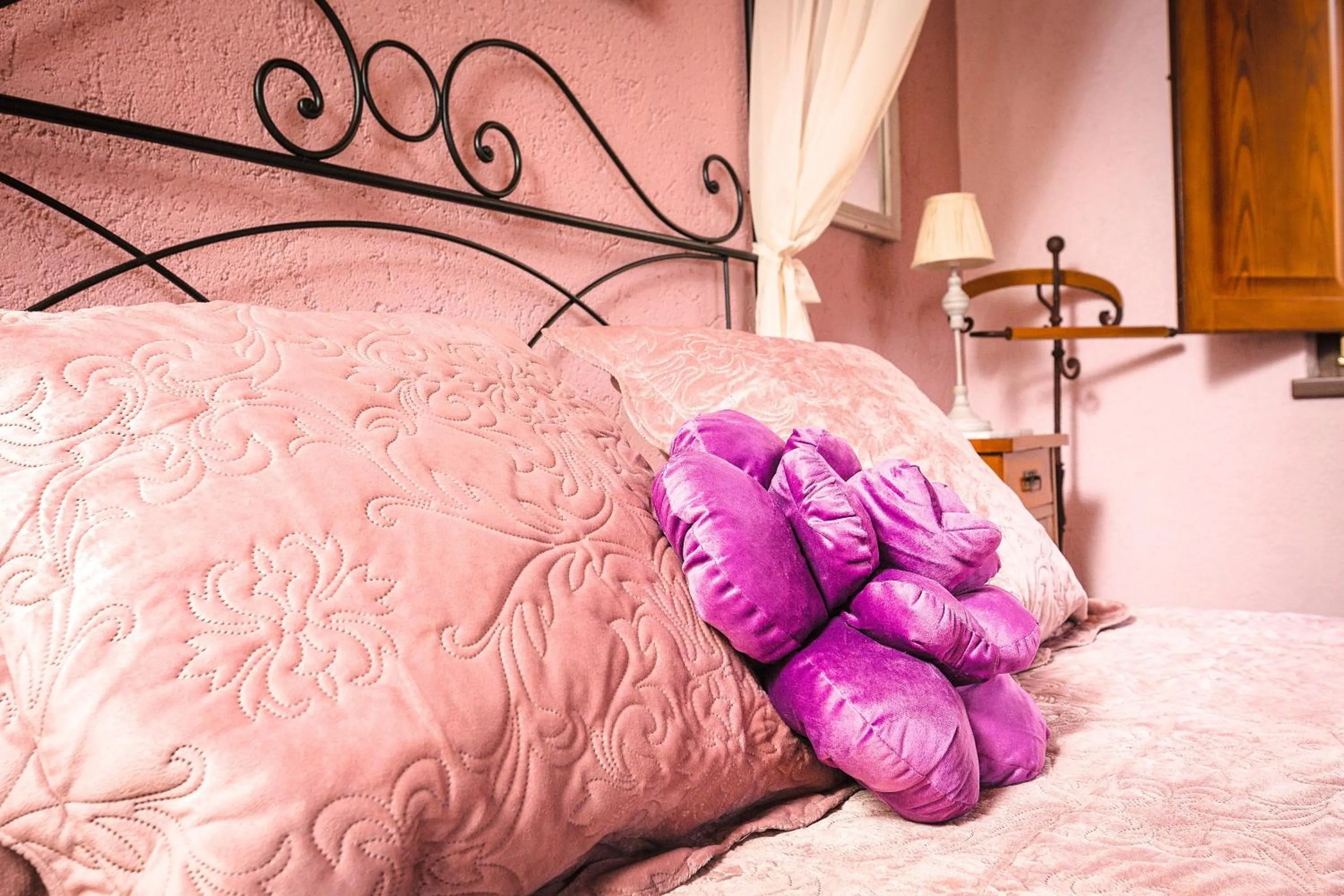 Bed in Relais Garden Cactus B&B