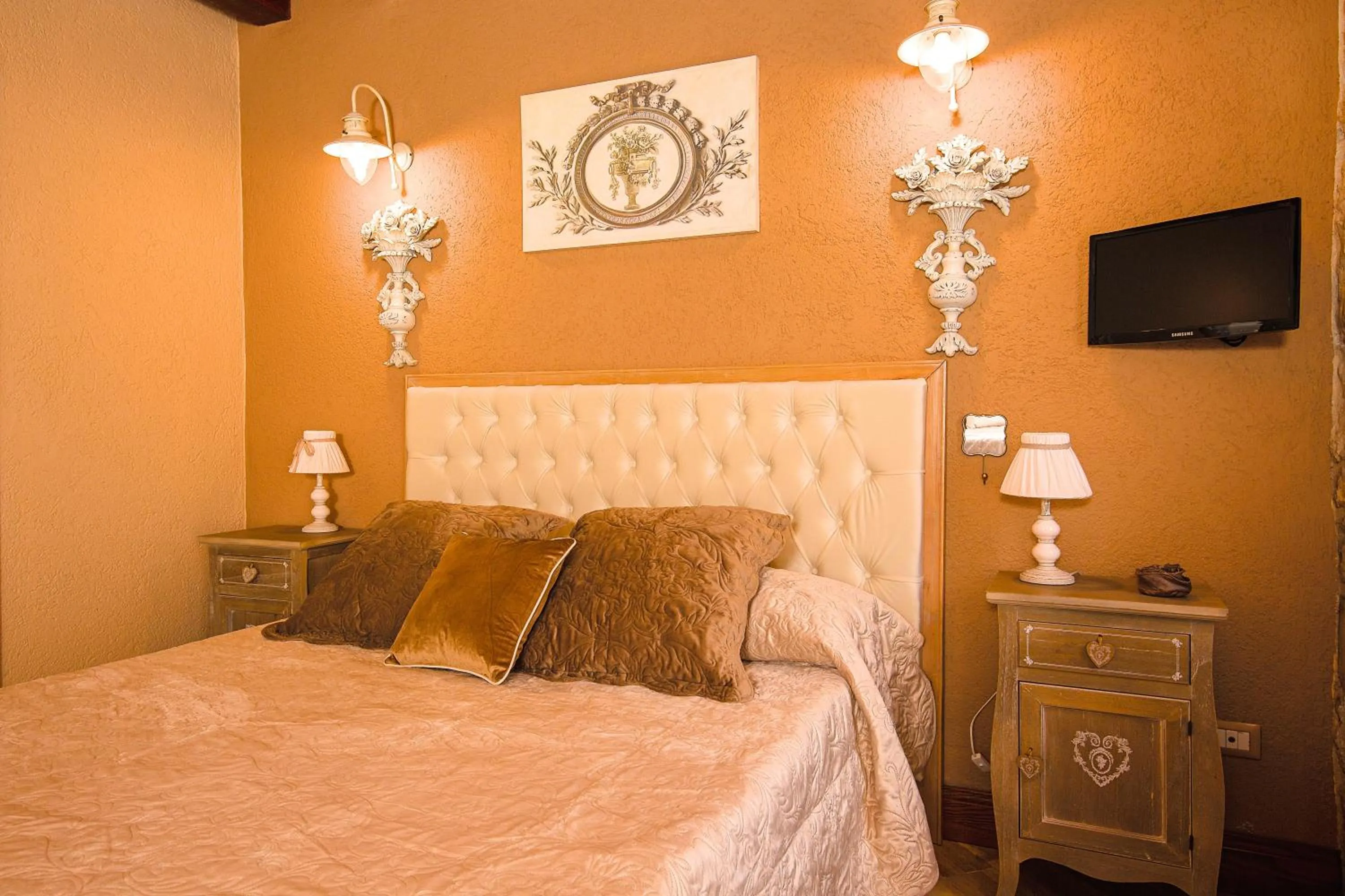 Bed in Relais Garden Cactus B&B