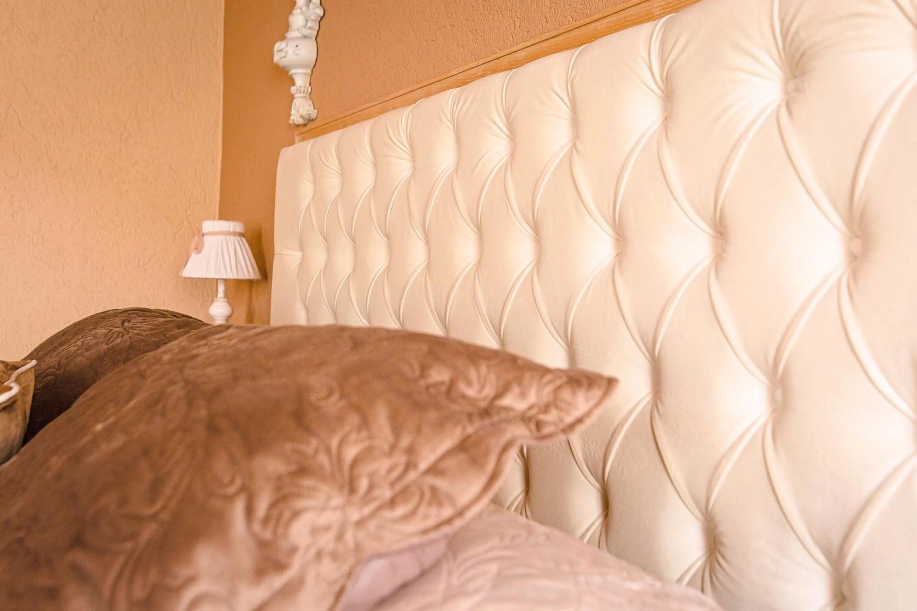 Bed in Relais Garden Cactus B&B