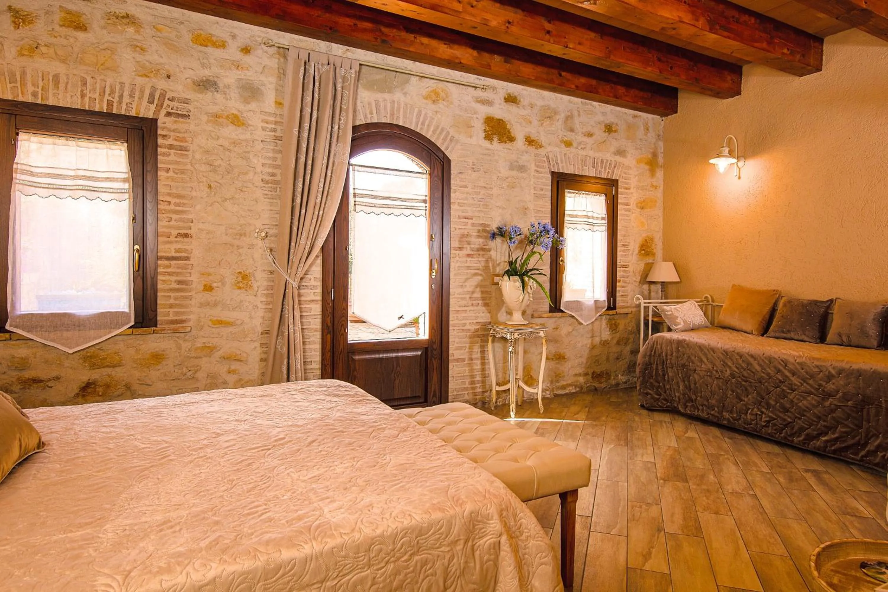 Bed in Relais Garden Cactus B&B