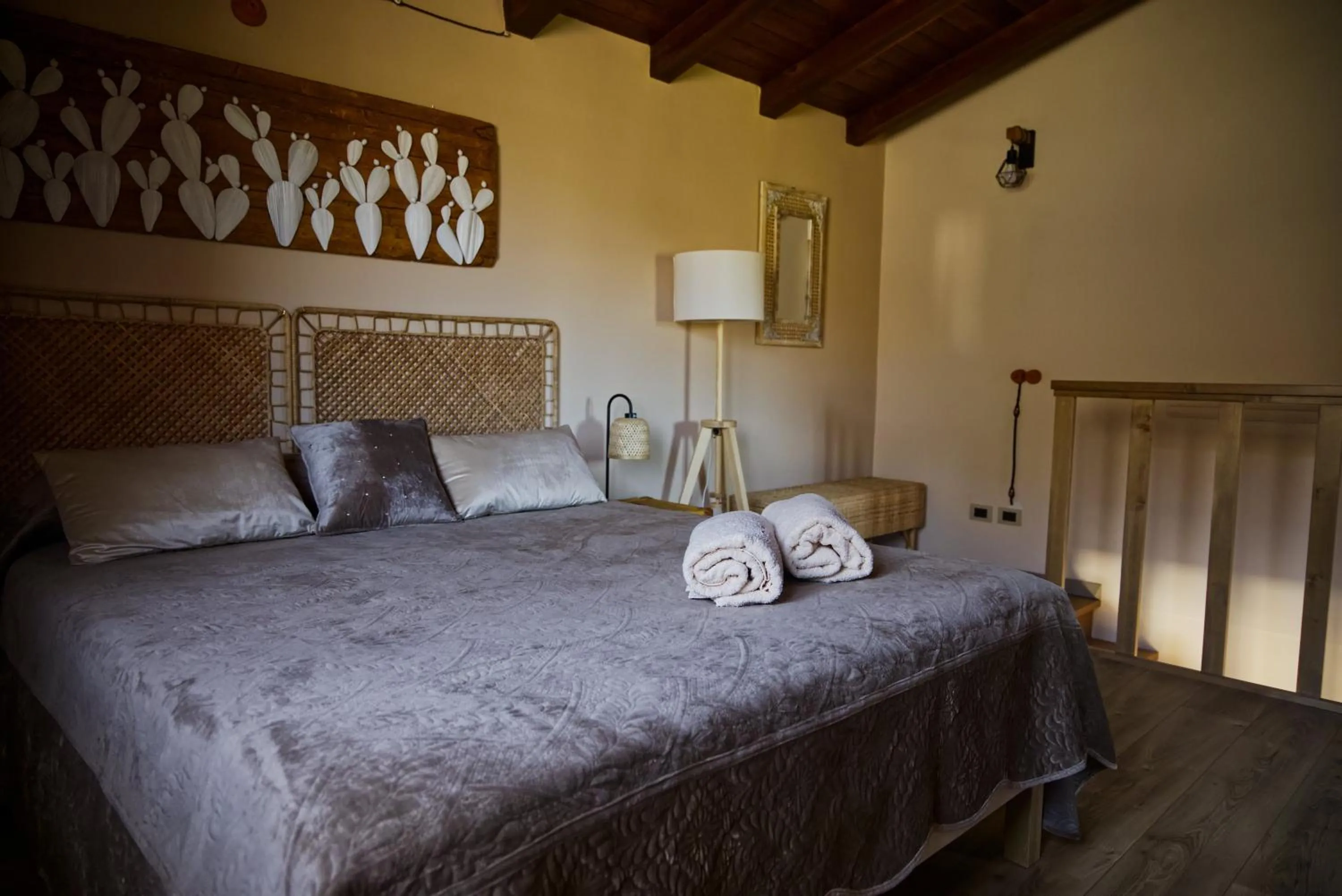 Bed in Relais Garden Cactus B&B