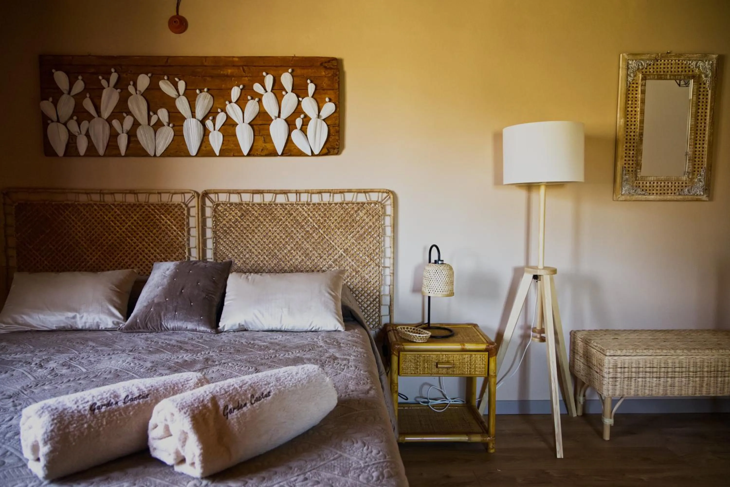 Bed in Relais Garden Cactus B&B