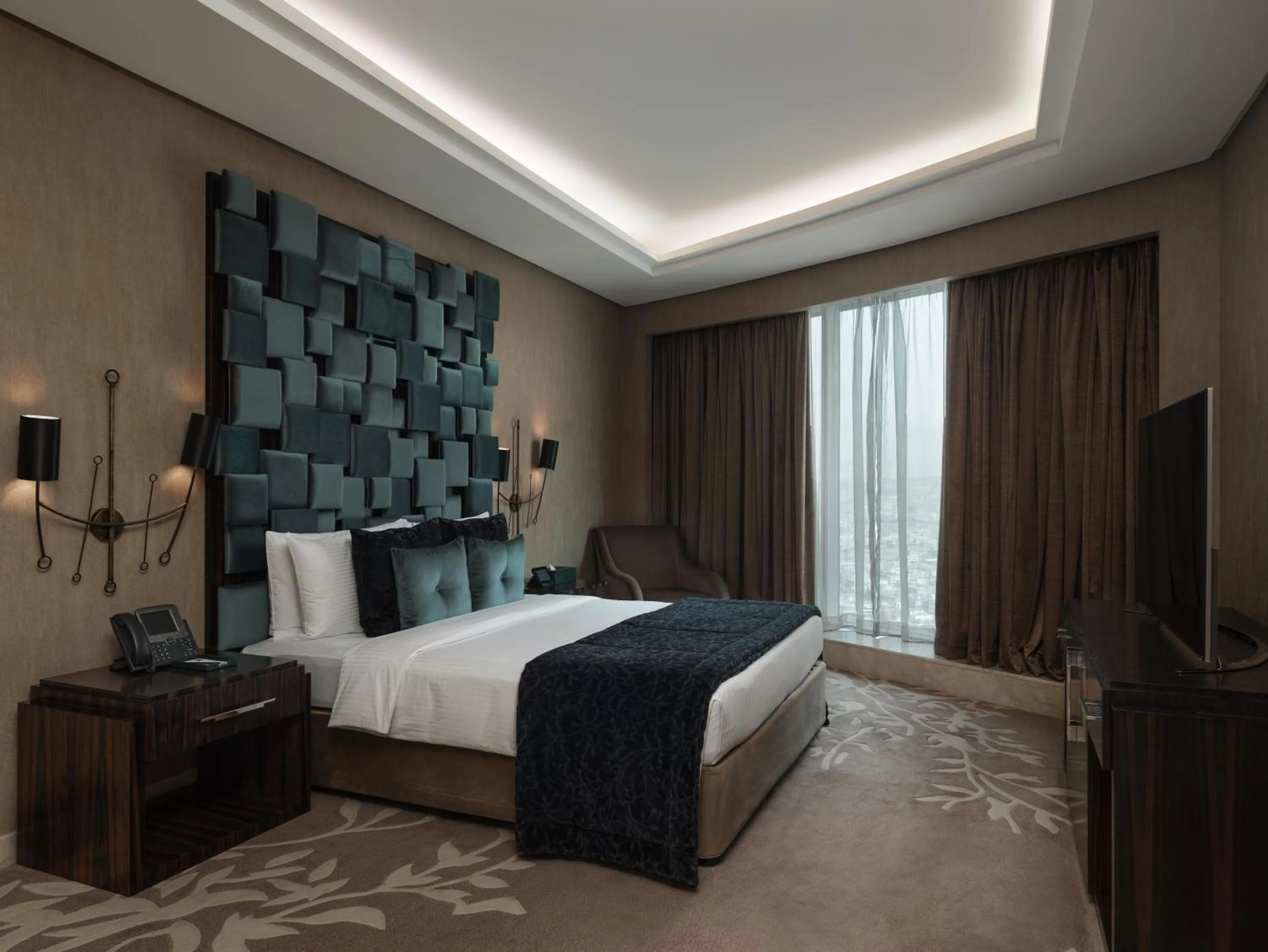 Bed in Grand Millennium Sulaimani