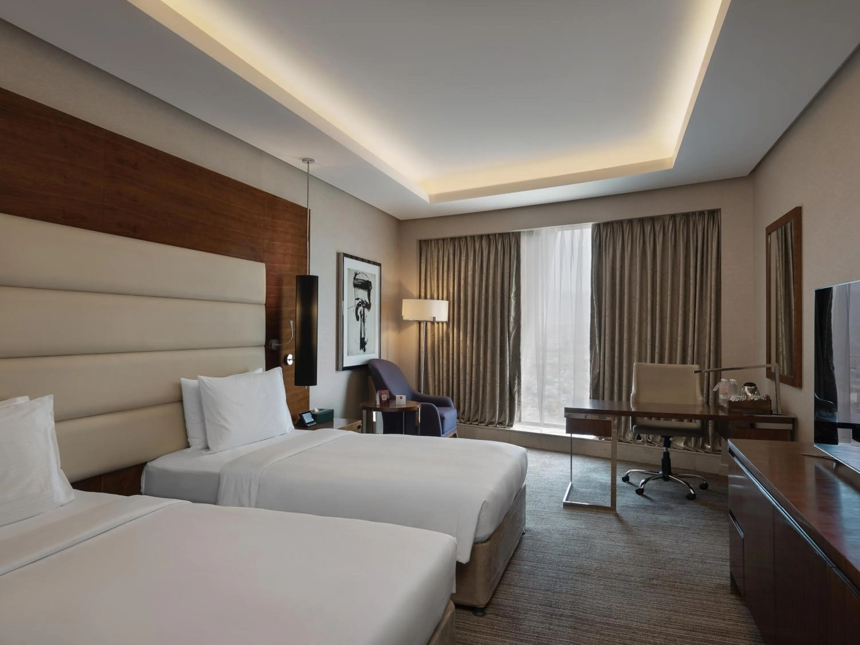 Bed in Grand Millennium Sulaimani