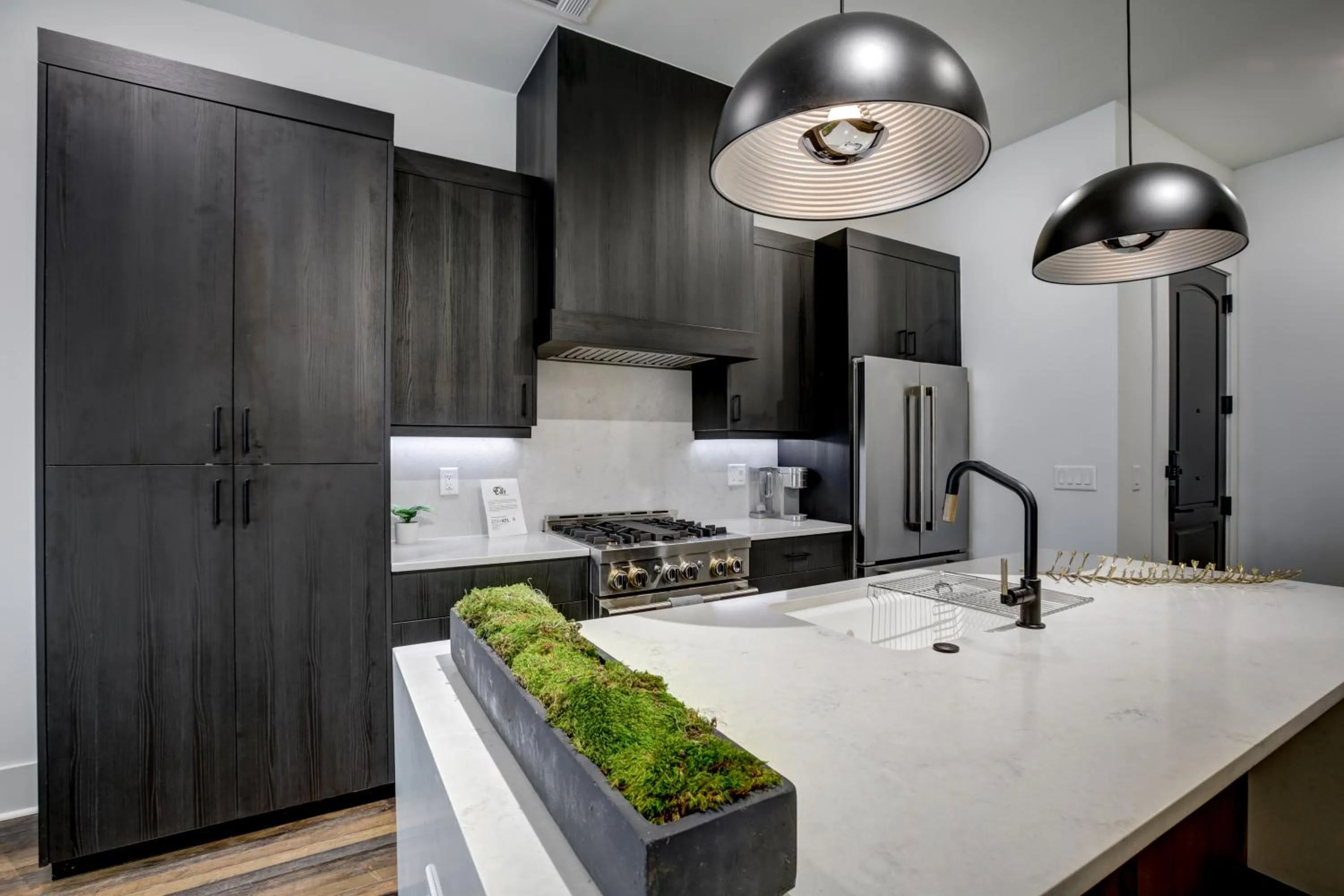 kitchen in Loft condo by Mercedes Benz w balcony Apt 101