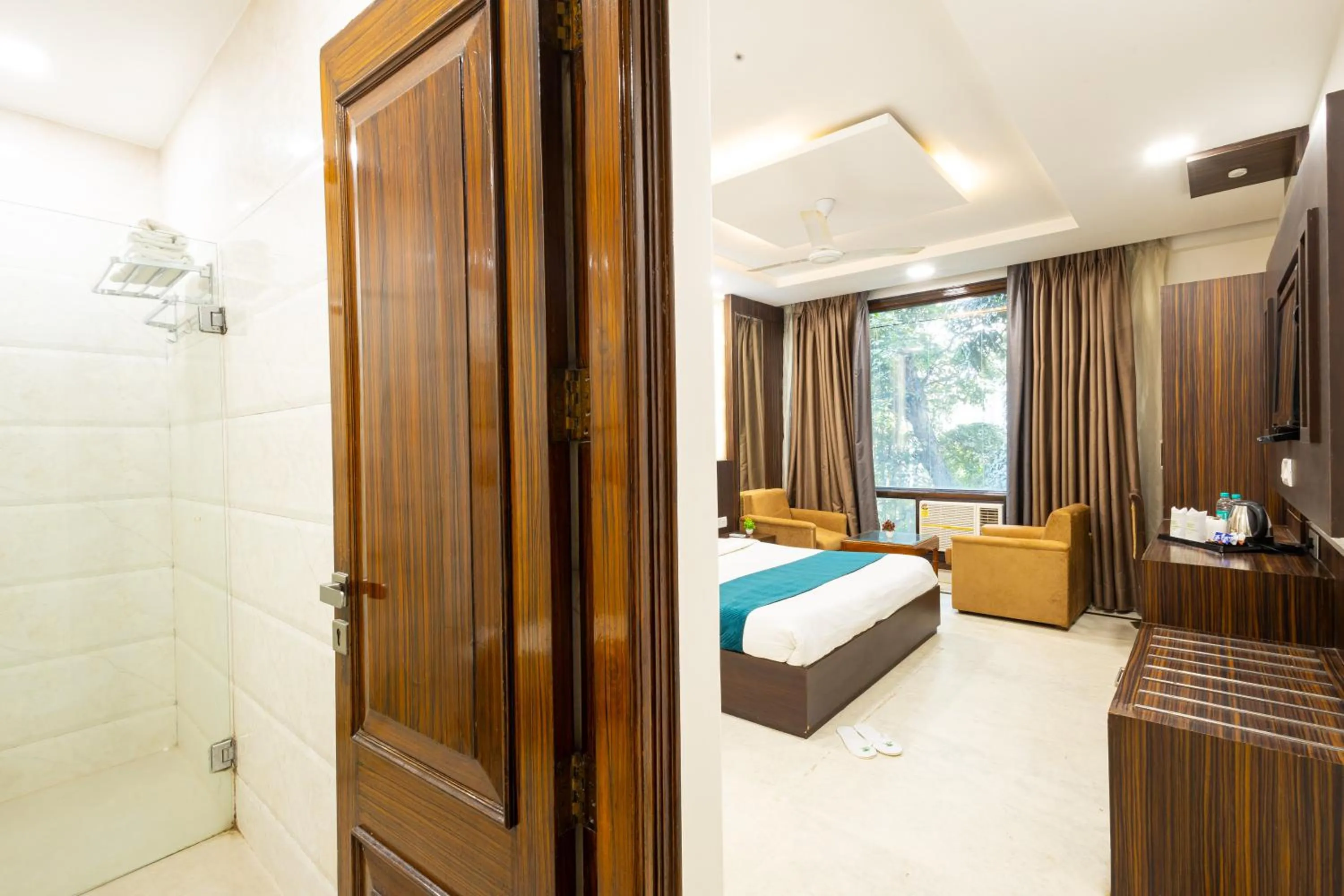 Photo of the whole room, Bed in Hotel Panickers Residency - Near Ganga Ram & BLK Hospital - Karol Bagh